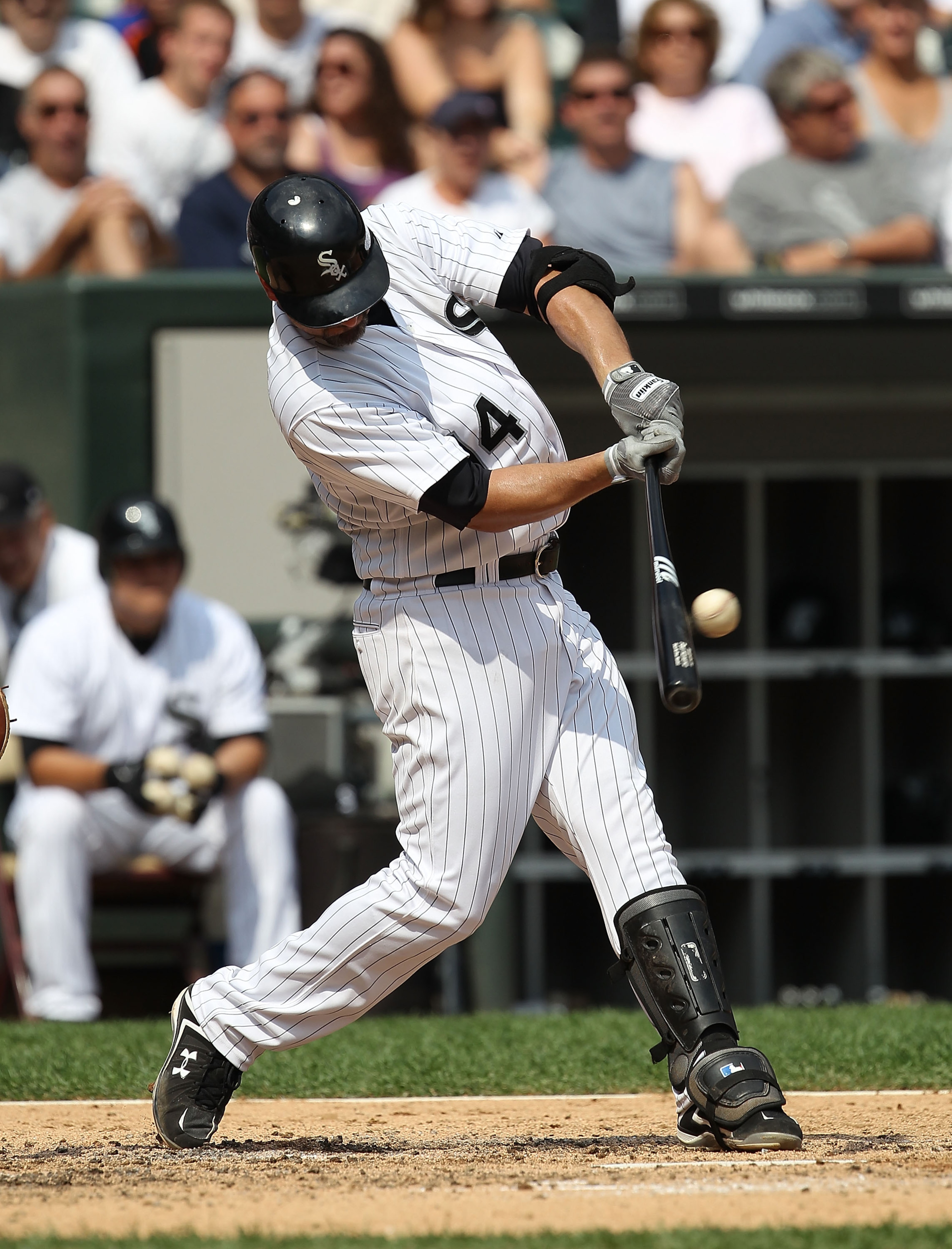 CHICAGO - AUGUST 29: Paul Konerko #14 of the Chicago White Sox hits the ball against the New York Yankees at U.S. Cellular Field on August 29, 2010 in Chicago, Illinois. The Yankees defeated the White Sox 2-1. (Photo by Jonathan Daniel/Getty Images) CHICAGO - AUGUST 29: Paul Konerko #14 of the Chicago White Sox hits the ball against the New York Yankees at U.S. Cellular Field on August 29, 2010 in Chicago, Illinois. The Yankees defeated the White Sox 2-1. (Photo by Jonathan Daniel/Getty Images)