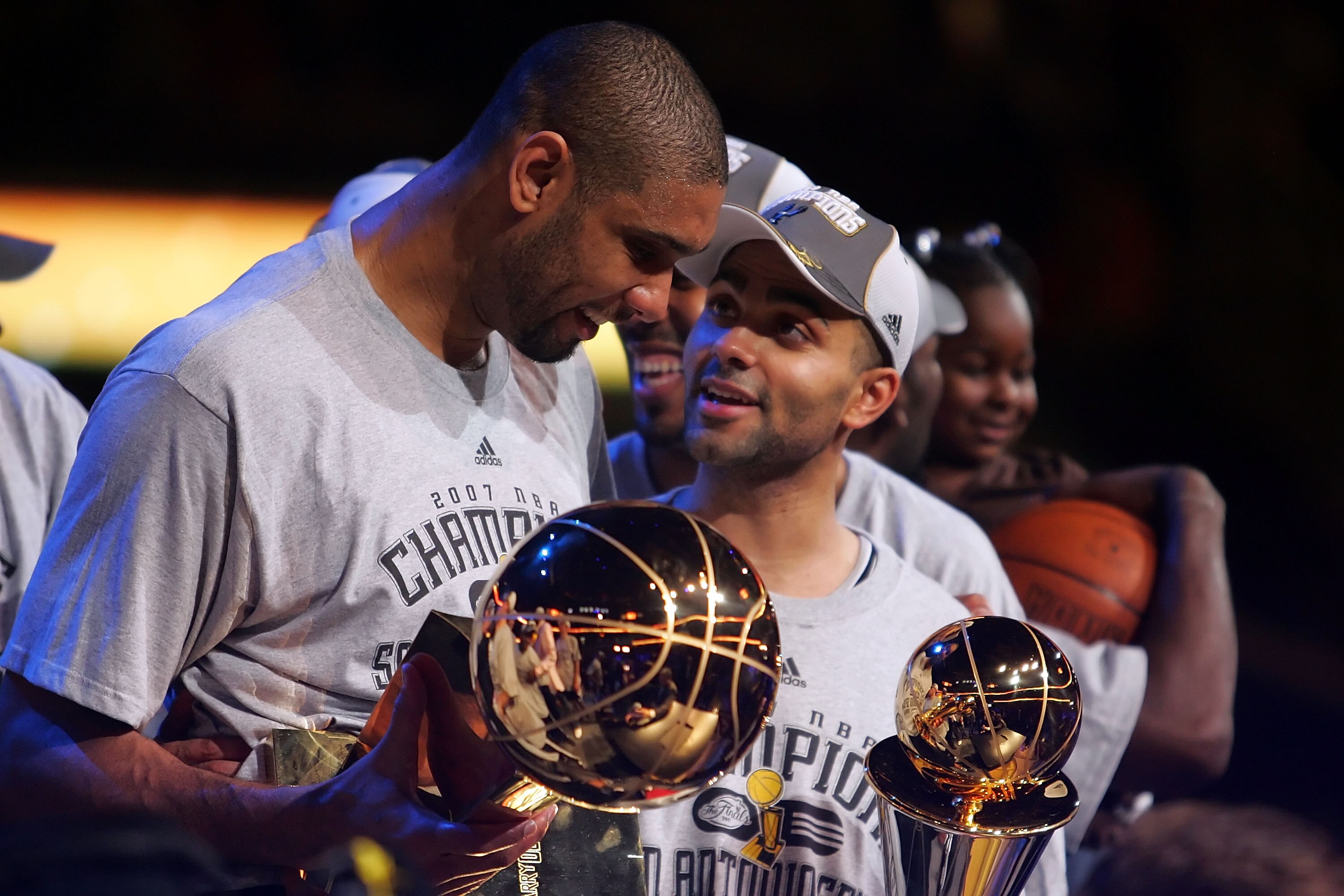 CLEVELAND - JUNE 14:  Tony Parker #9 and Tony Parker #21 of the San Antonio Spurs celebrate the win over the Cleveland Cavaliers in Game Four of the NBA Finals on June 14, 2007 at the Quicken Loans Arena in Cleveland, Ohio. NOTE TO USER: User expressly ac