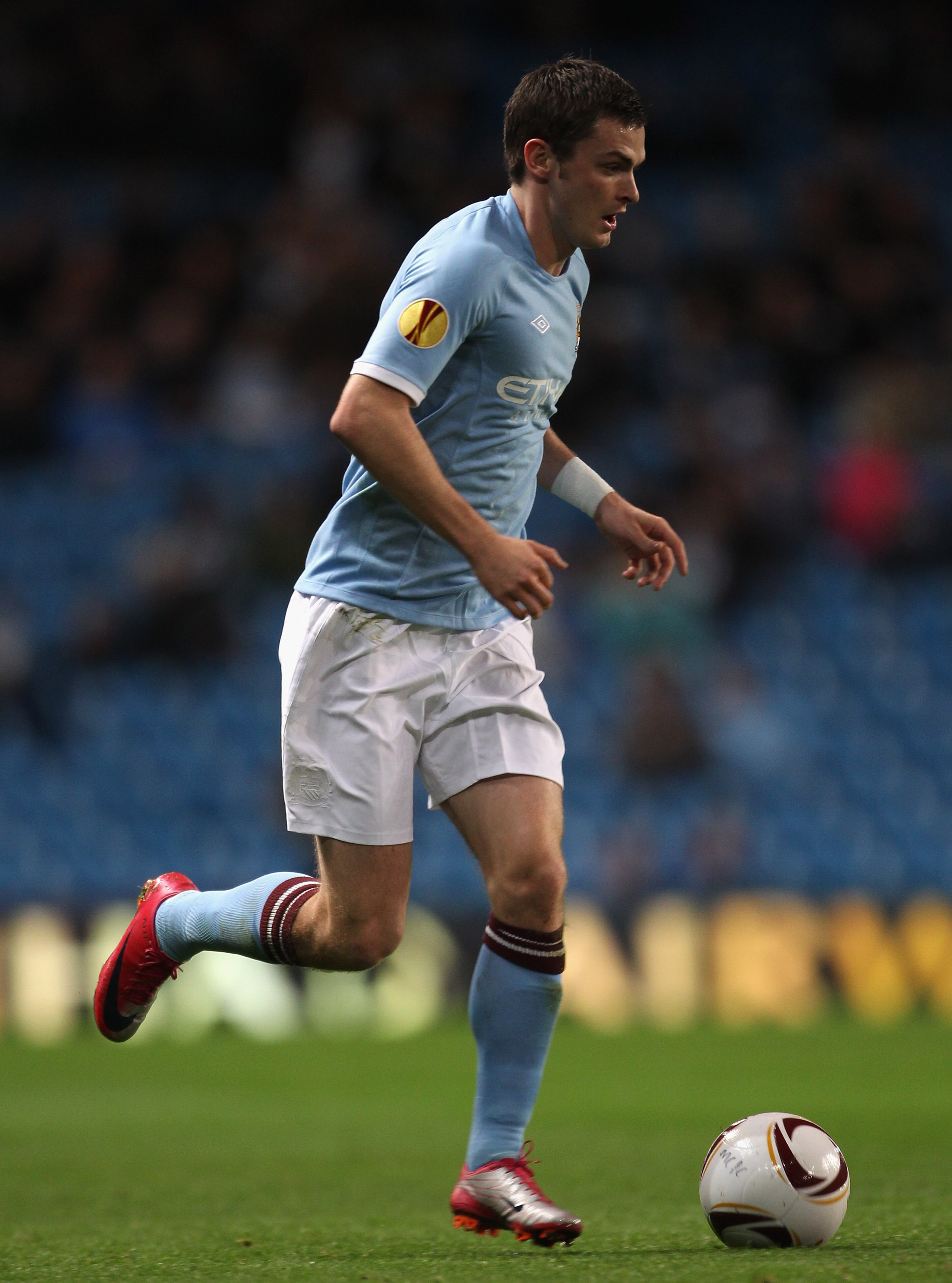 MANCHESTER, ENGLAND - OCTOBER 21: Adam Johnson of Manchester City runs with the ball during the UEFA Europa League Group A match between Manchester City and KKS Lech Poznan at City of Manchester Stadium on October 21, 2010 in Manchester, England. (Photo MANCHESTER, ENGLAND - OCTOBER 21: Adam Johnson of Manchester City runs with the ball during the UEFA Europa League Group A match between Manchester City and KKS Lech Poznan at City of Manchester Stadium on October 21, 2010 in Manchester, England. (Photo