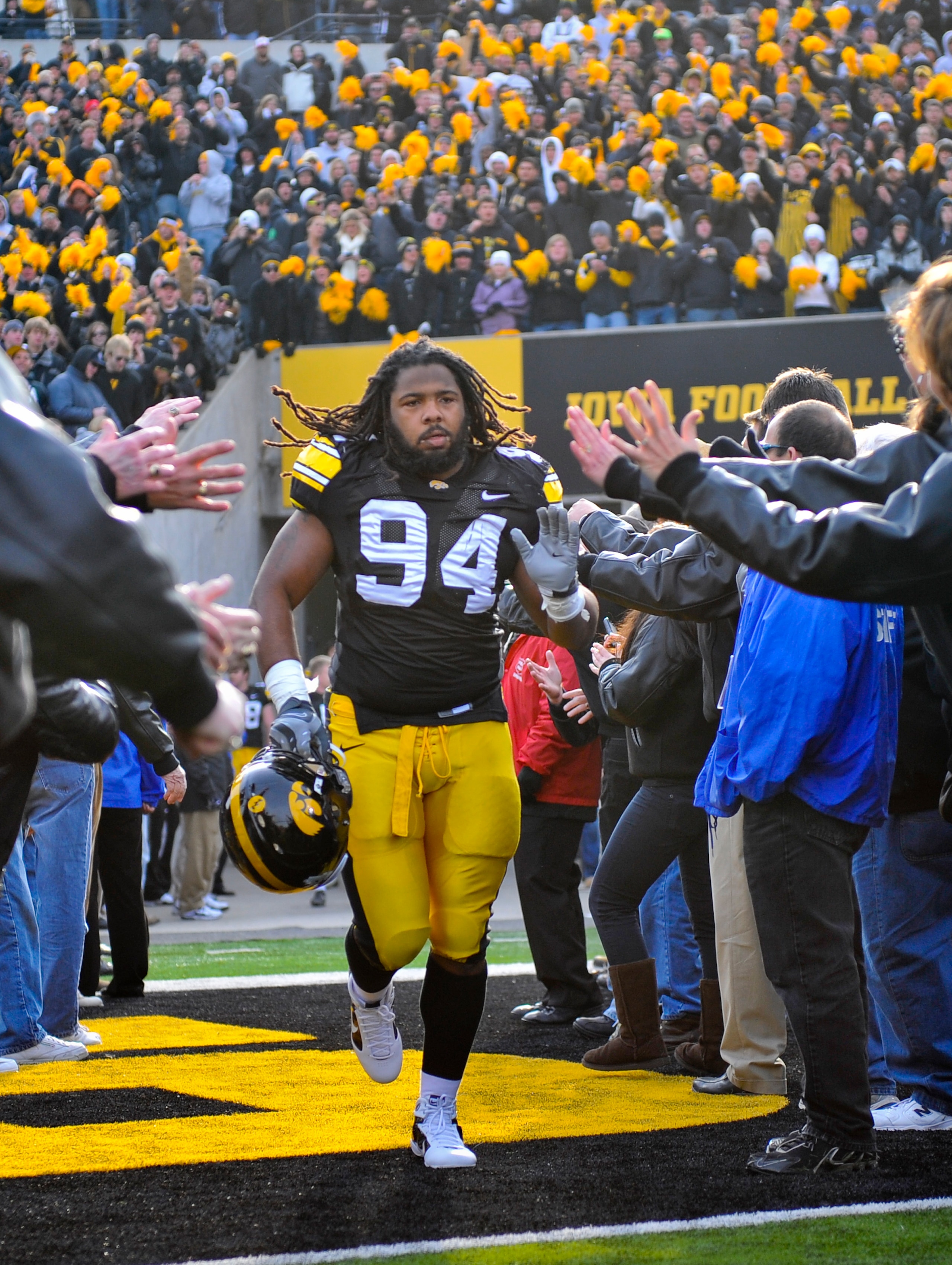 IOWA CITY, IA - NOVEMBER 20:  Defensive end Adrian Clayborn #94 of the University of Iowa Hawkeyes takes the field for the Ohio State Buckeyes NCAA college football game at Kinnick Stadium on November 20, 2010 in Iowa City, Iowa. Ohio State won 20-17 over
