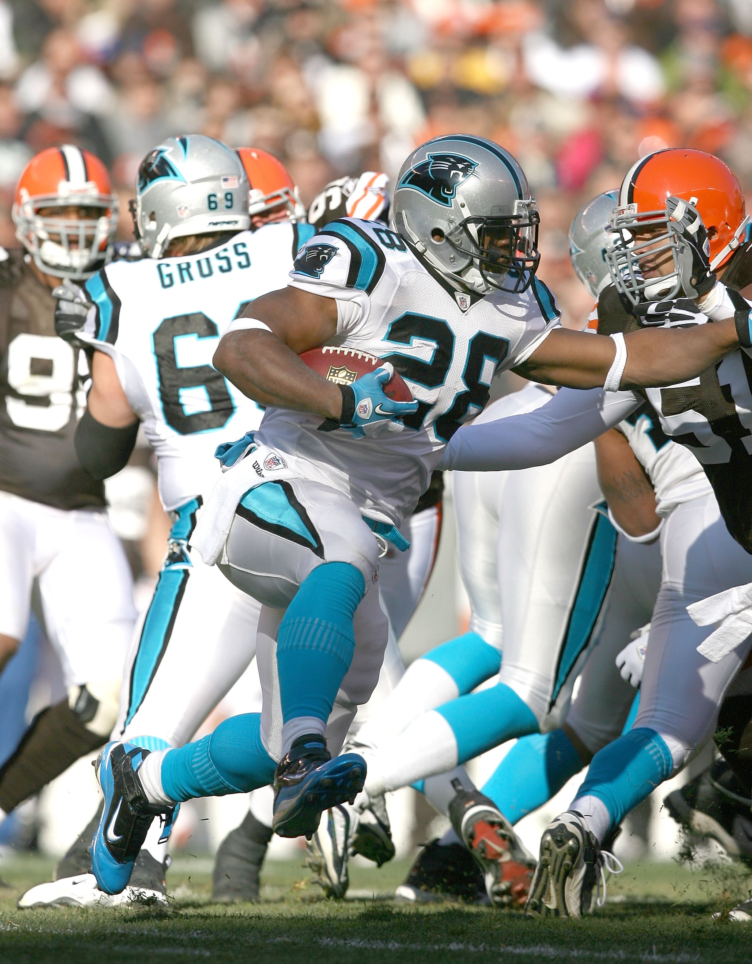 CLEVELAND - NOVEMBER 28:  Running back Jonathan Stewart #28 of the Carolina Panthers runs by linebacker Chris Gocong #51 of the Cleveland Browns at Cleveland Browns Stadium on November 28, 2010 in Cleveland, Ohio.  (Photo by Matt Sullivan/Getty Images)