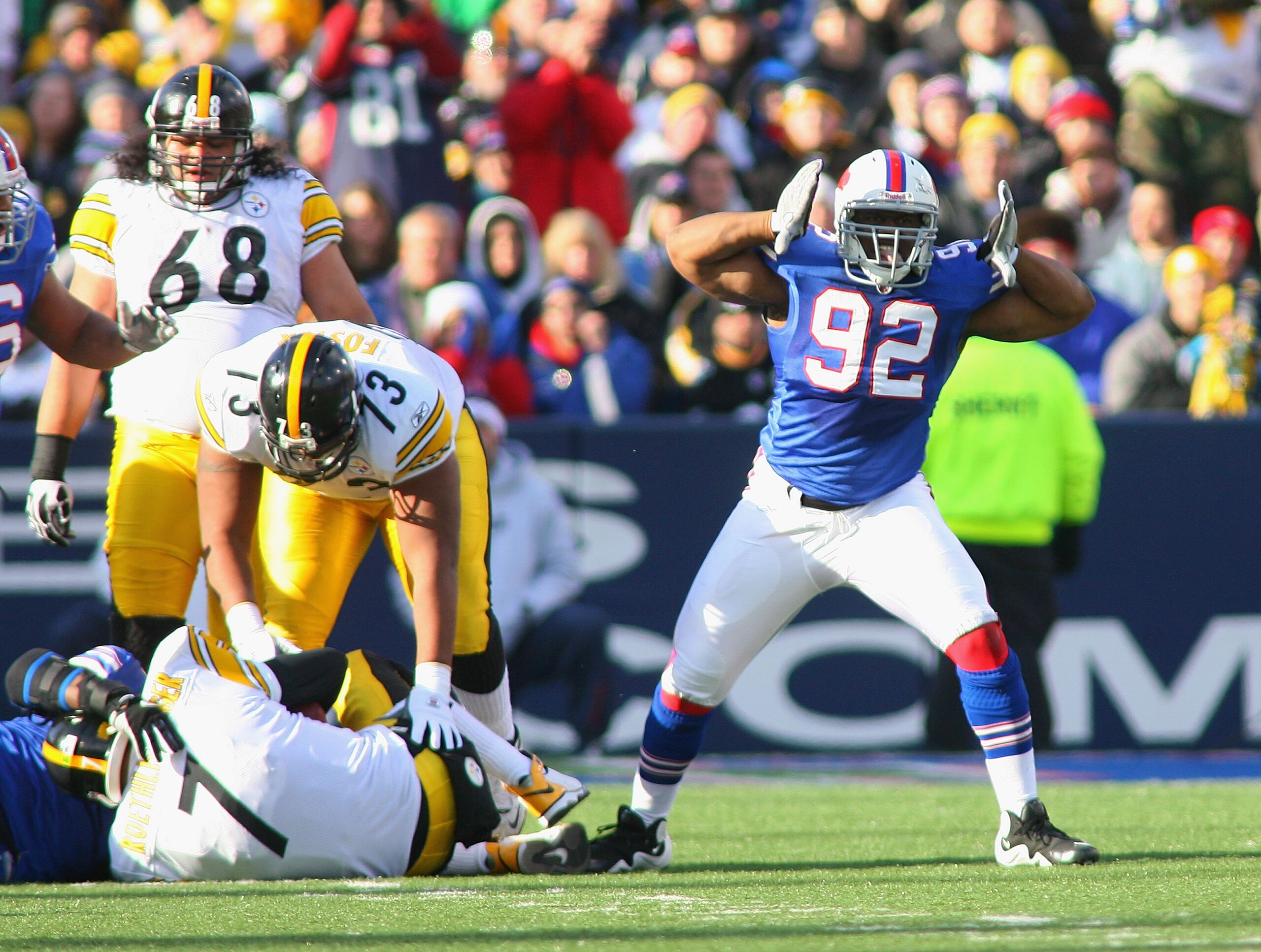 ORCHARD PARK, NY - NOVEMBER 28: Alex Carrington #92 of the Buffalo Bills reacts after sacking Ben Roethlisberger #7 of the Pittsburgh Steelers at Ralph Wilson Stadium at Ralph Wilson Stadium on November 28, 2010 in Orchard Park, New York.  (Photo by Rick