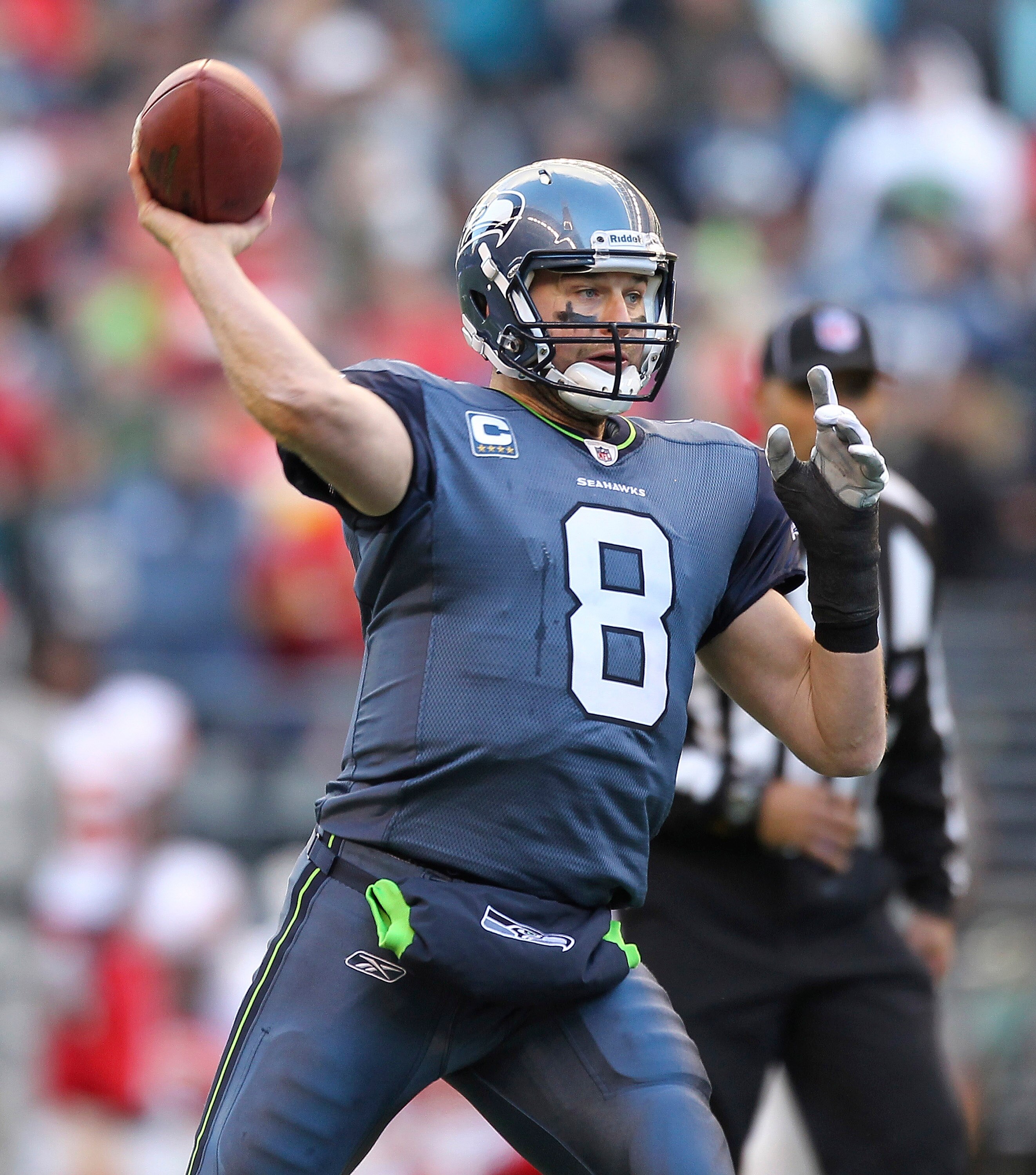 SEATTLE - NOVEMBER 28:  Quarterback Matt Hasselbeck #8 of the Seattle Seahawks throws a touchdown pass to Chris Baker in the third quarter against the Kansas City Chiefs at Qwest Field on November 28, 2010 in Seattle, Washington. The Chiefs defeated the S