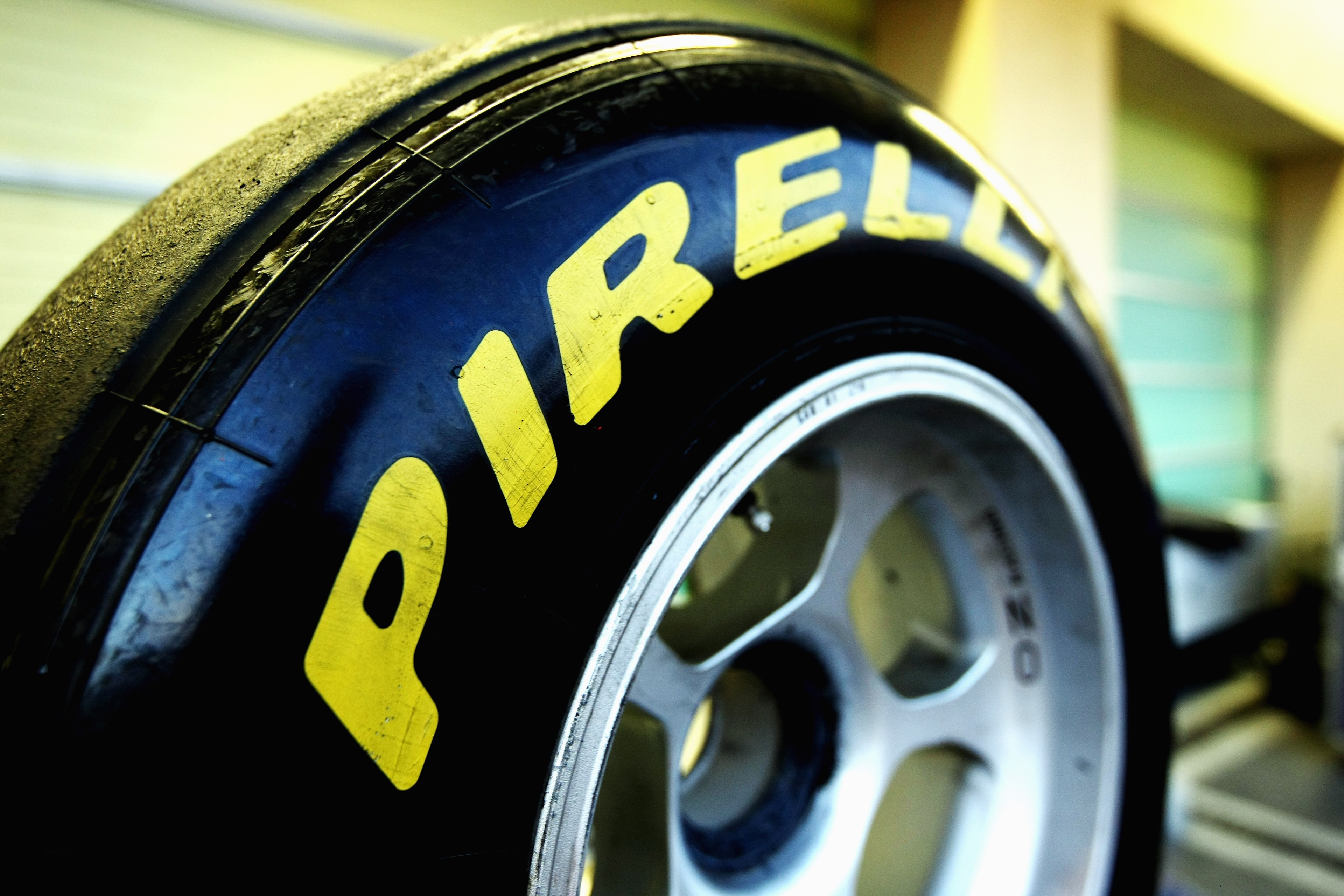 ABU DHABI, UNITED ARAB EMIRATES - NOVEMBER 19:  Pirelli F1 Tyres being prepared during the Formula 1 Pirelli Tyre Testing at the Yas Marina Circuit on November 19, 2010 in Abu Dhabi, United Arab Emirates.  (Photo by Andrew Hone/Andrew Hone/Getty Images)
