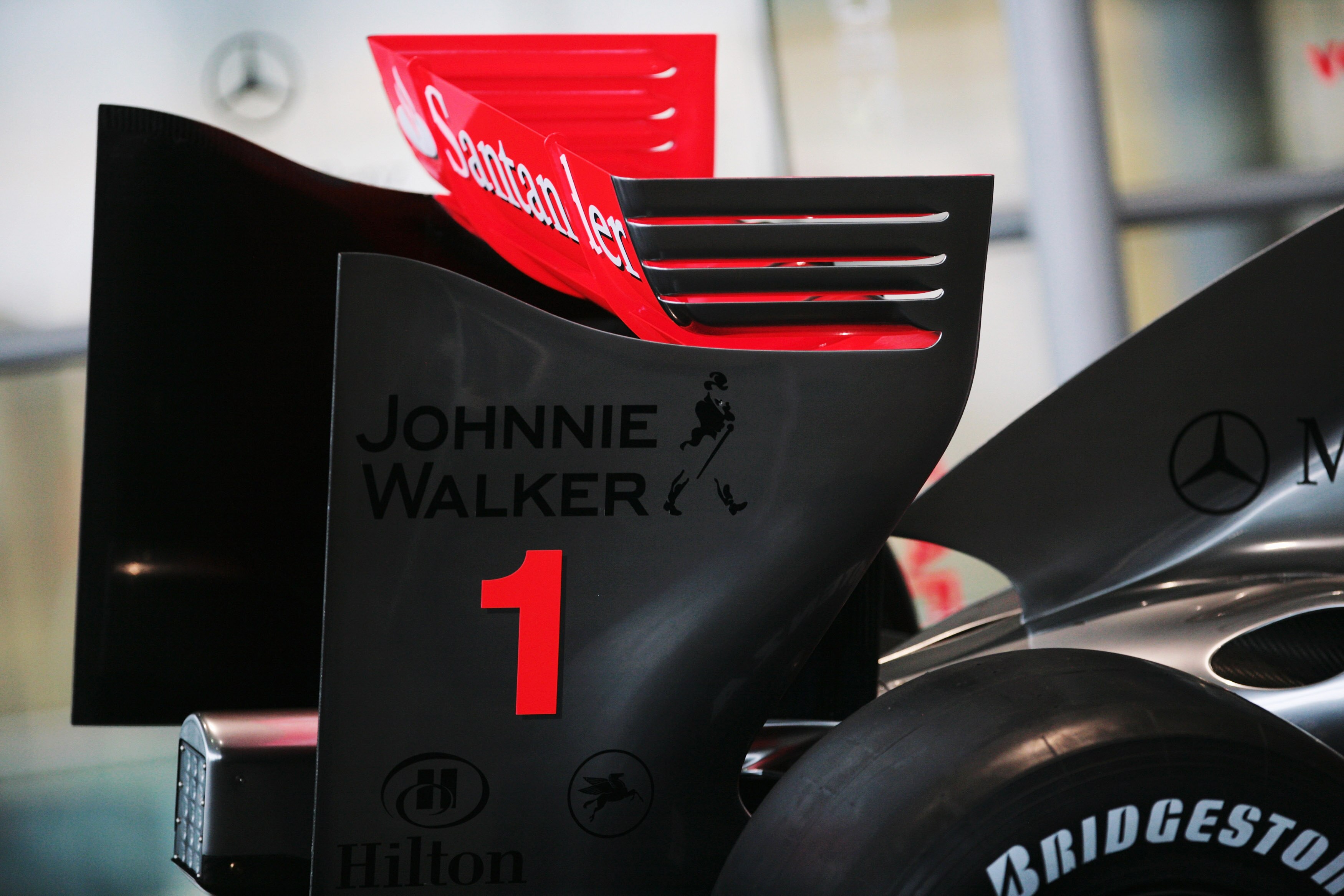 WOKING, UNITED KINGDOM - JANUARY 16:  New regulation rear wing and slick tyres are seen at the unveiling of the McLaren Mercedes MP4-24 at the McLaren Technology Centre on January 16, 2008 in Woking, England.  (Photo by Ker Robertson/Getty Images)