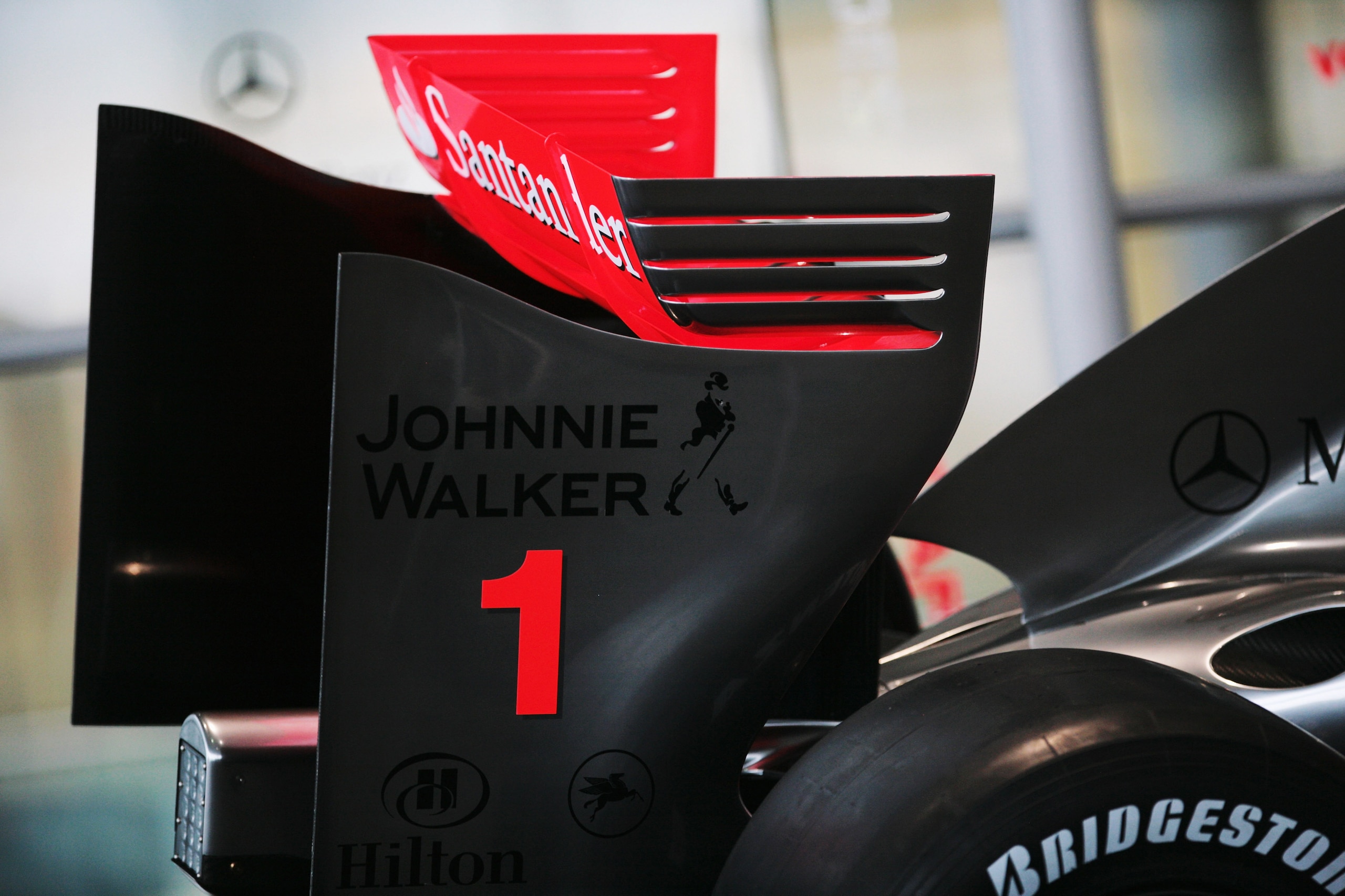 WOKING, UNITED KINGDOM - JANUARY 16:  New regulation rear wing and slick tyres are seen at the unveiling of the McLaren Mercedes MP4-24 at the McLaren Technology Centre on January 16, 2008 in Woking, England.  (Photo by Ker Robertson/Getty Images)