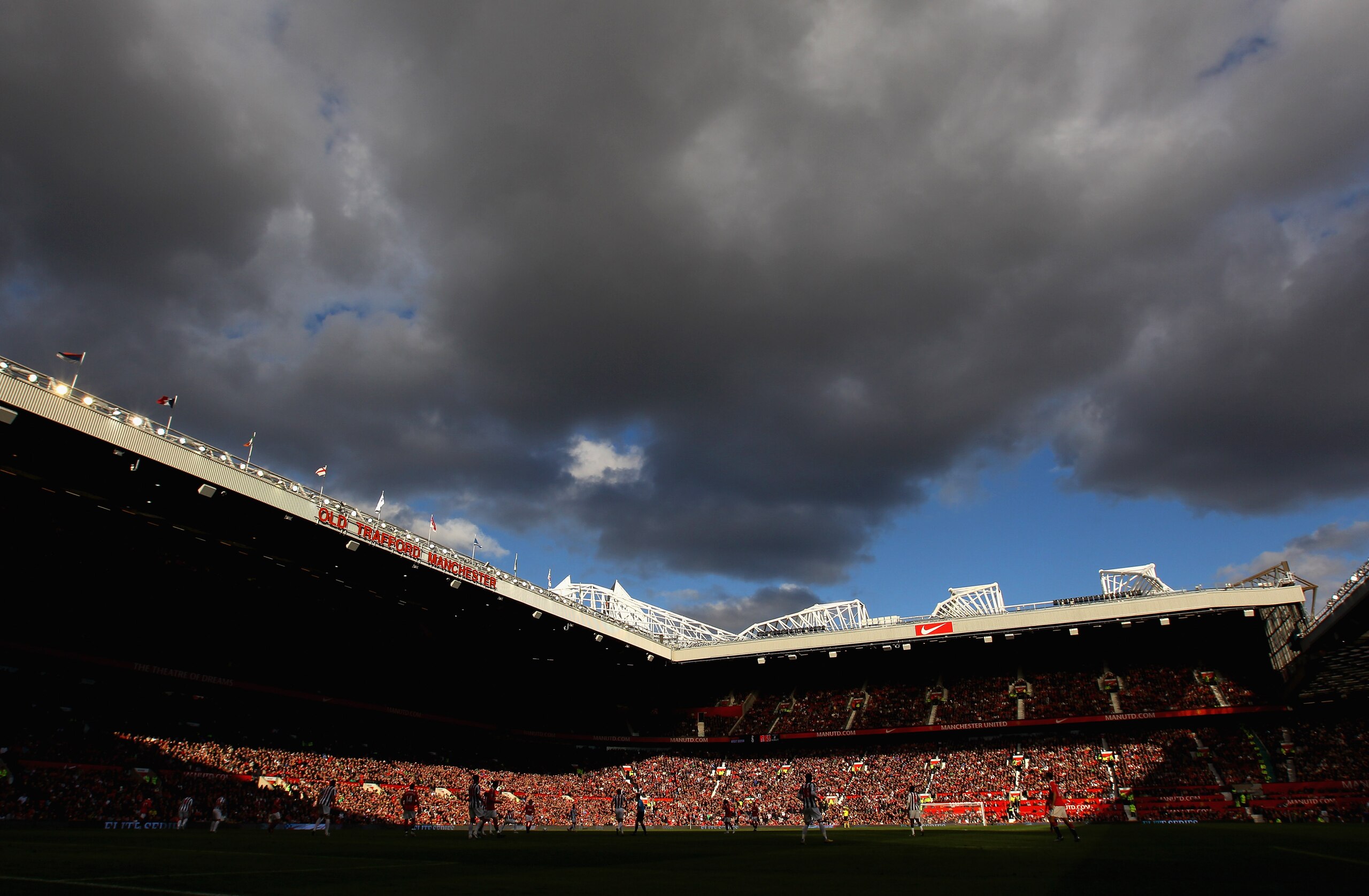 MANCHESTER, ENGLAND - OCTOBER 16:  Black clouds gather over Old Trafford during the Barclays Premier League match between Manchester United and West Bromwich Albion at Old Trafford on October 16, 2010 in Manchester, England.  (Photo by Alex Livesey/Getty