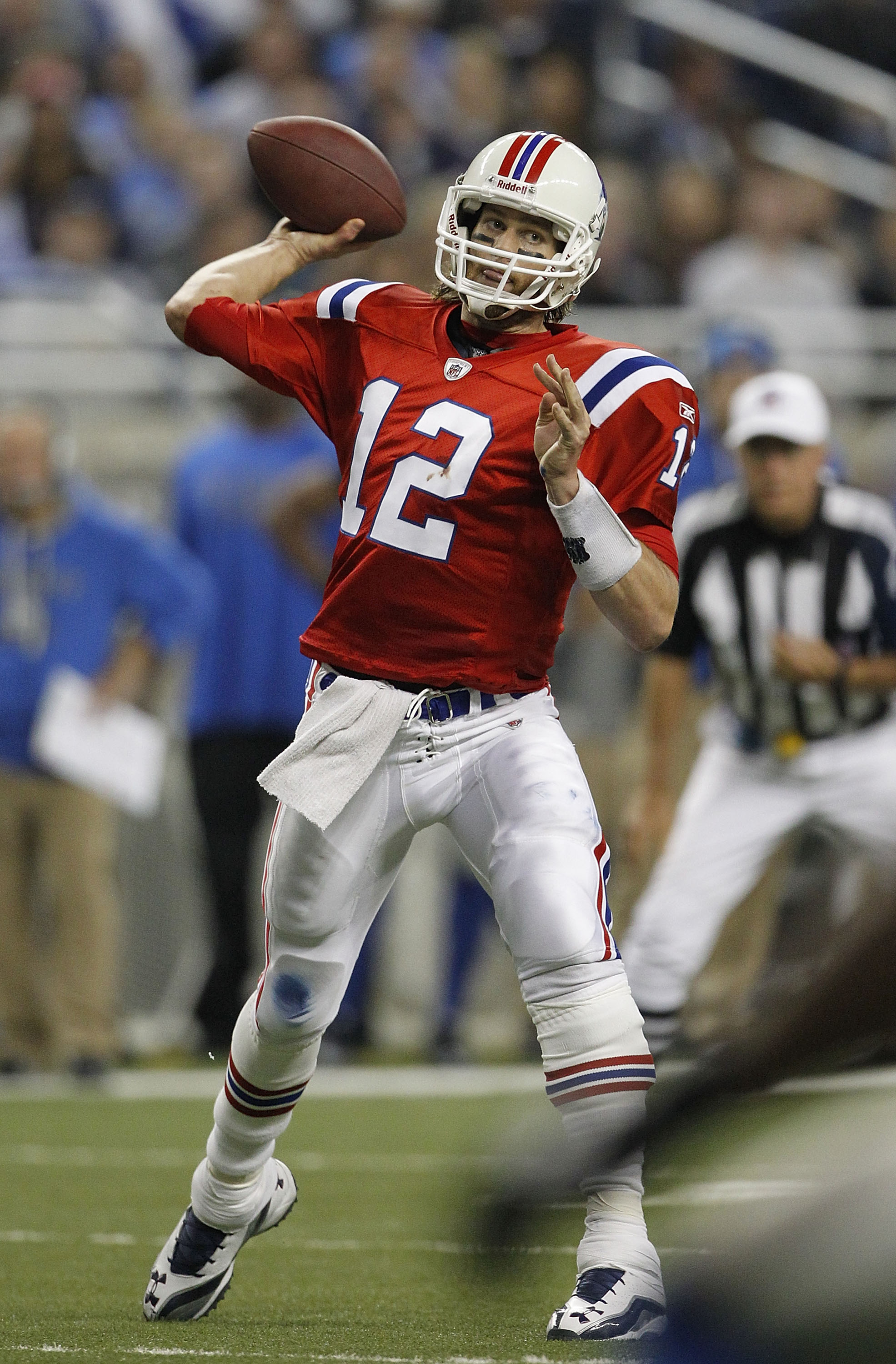DETROIT - NOVEMBER 25:  Tom Brady #12 of the New England Patriots drops back to pass during the game against the Detroit Lions at Ford Field on November 25, 2010 in Detroit, Michigan. New England defeated Detroit 45-24.  (Photo by Leon Halip/Getty Images)