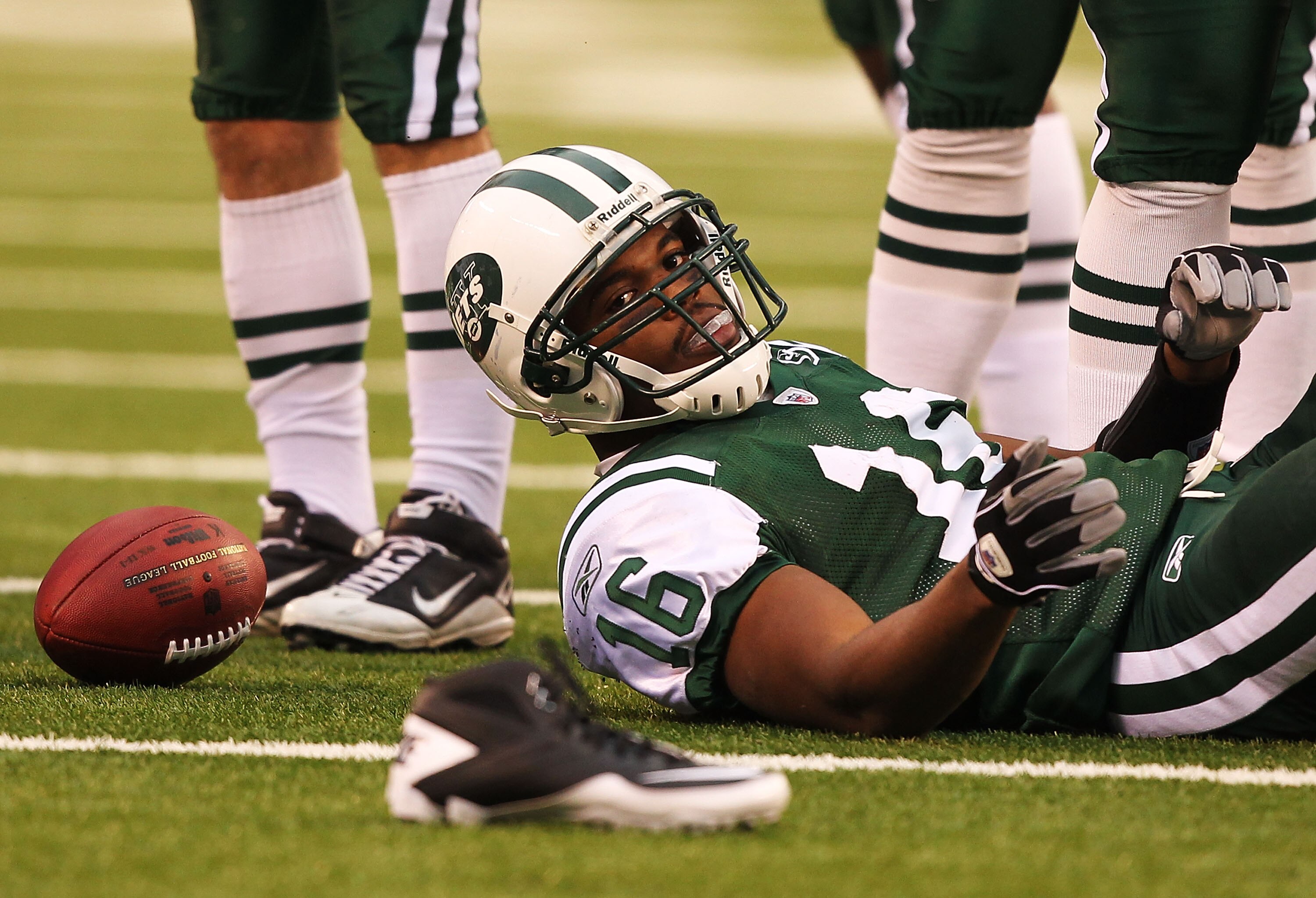 EAST RUTHERFORD, NJ - NOVEMBER 21:  Brad Smith #16 of the New York Jets loses his shoe after a runback against the Houston Texans during their  game on November 21, 2010 at the New Meadowlands Stadium in East Rutherford, New Jersey.  (Photo by Al Bello/Ge