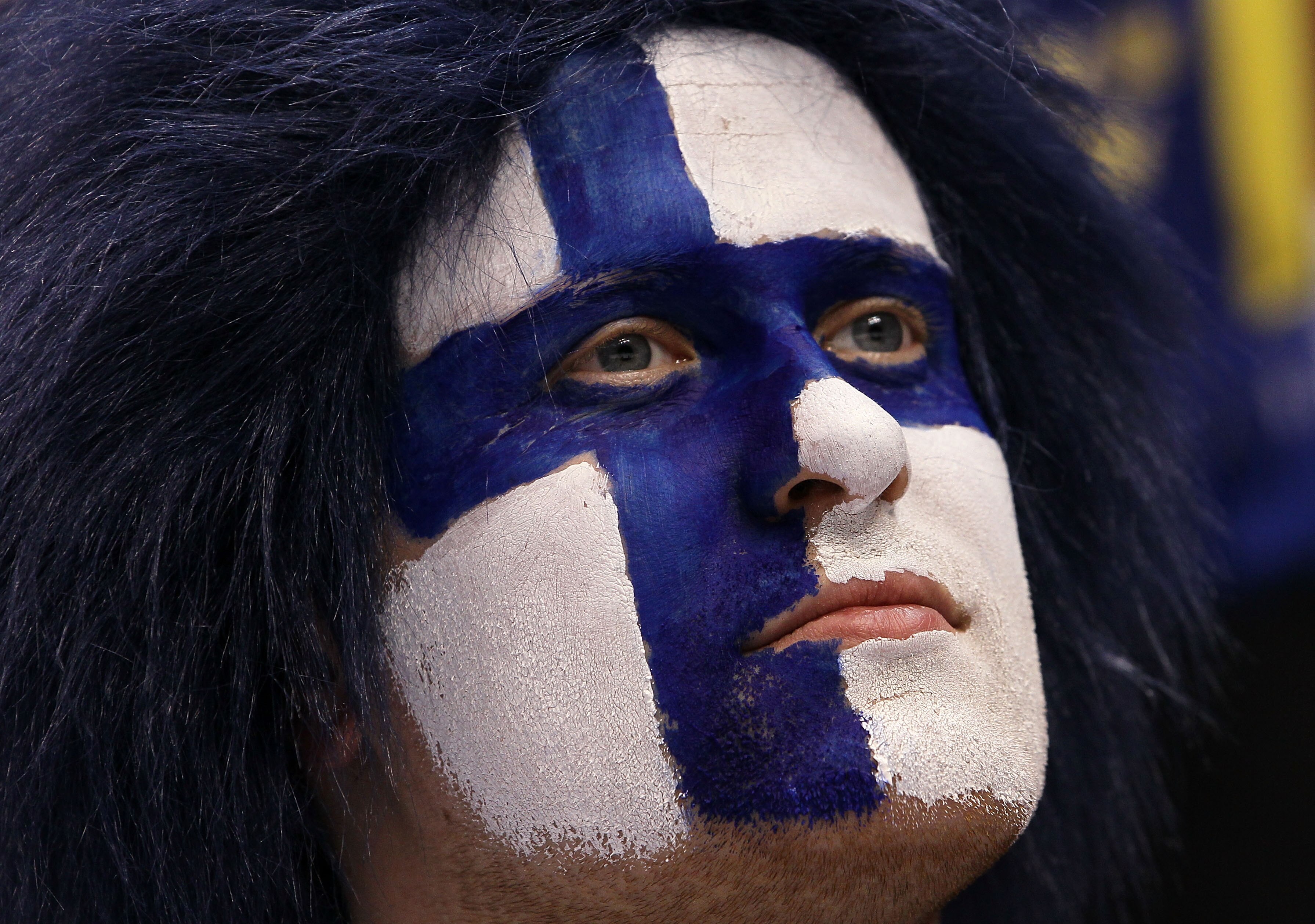 VANCOUVER, BC - FEBRUARY 21:  A fan in support of Finland looks on against Sweden during the ice hockey men's preliminary game between Sweden and Finland on day 10 of the Vancouver 2010 Winter Olympics at Canada Hockey Place on February 21, 2010 in Vancou
