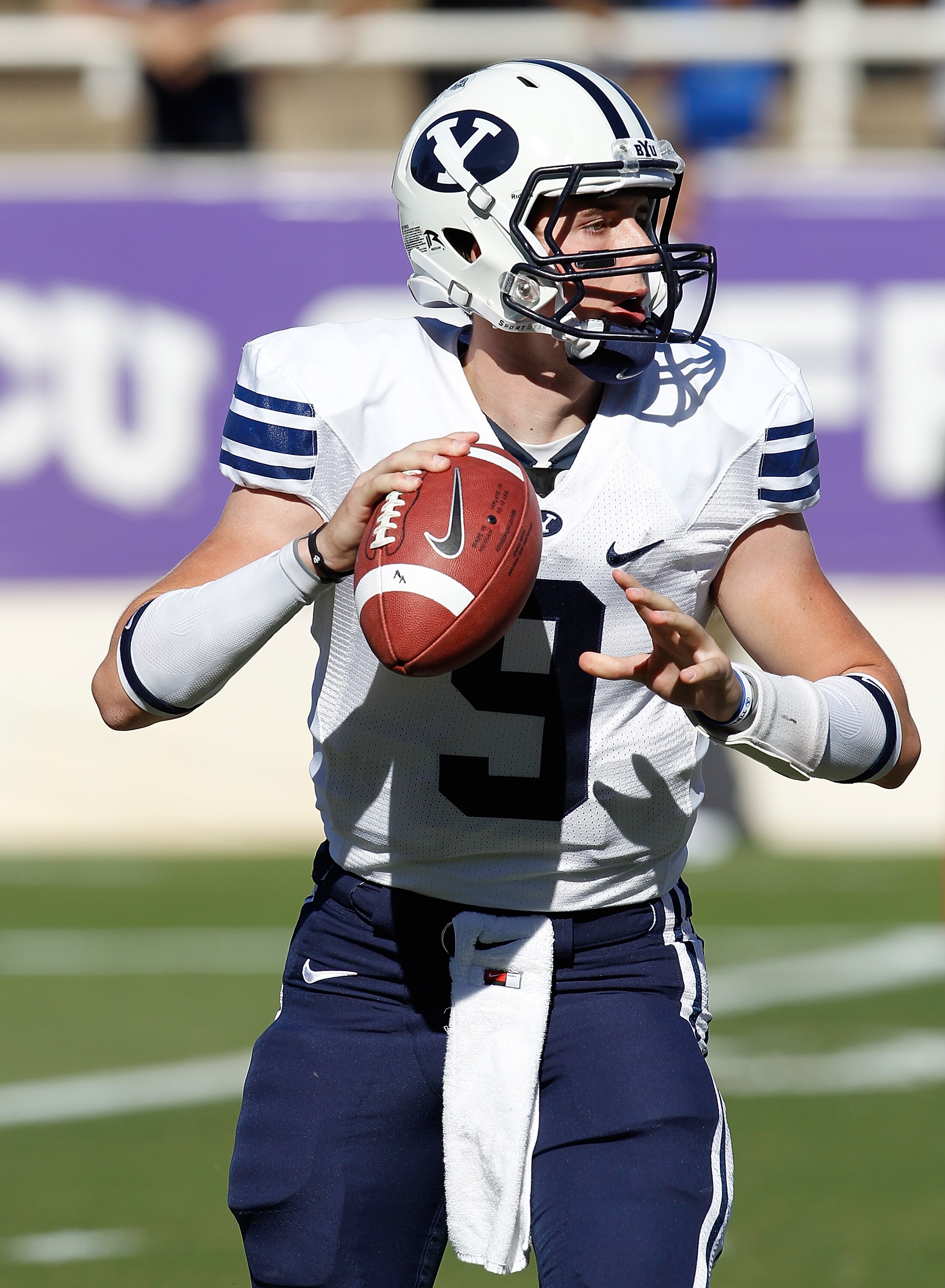 FORT WORTH, TX - OCTOBER 16:  Quarterback Jake Heaps #9 of the Brigham Young University Cougars throws a pass against the Texas Christian University Horned Frogs at Amon G. Carter Stadium on October 16, 2010 in Fort Worth, Texas.  (Photo by Tom Pennington