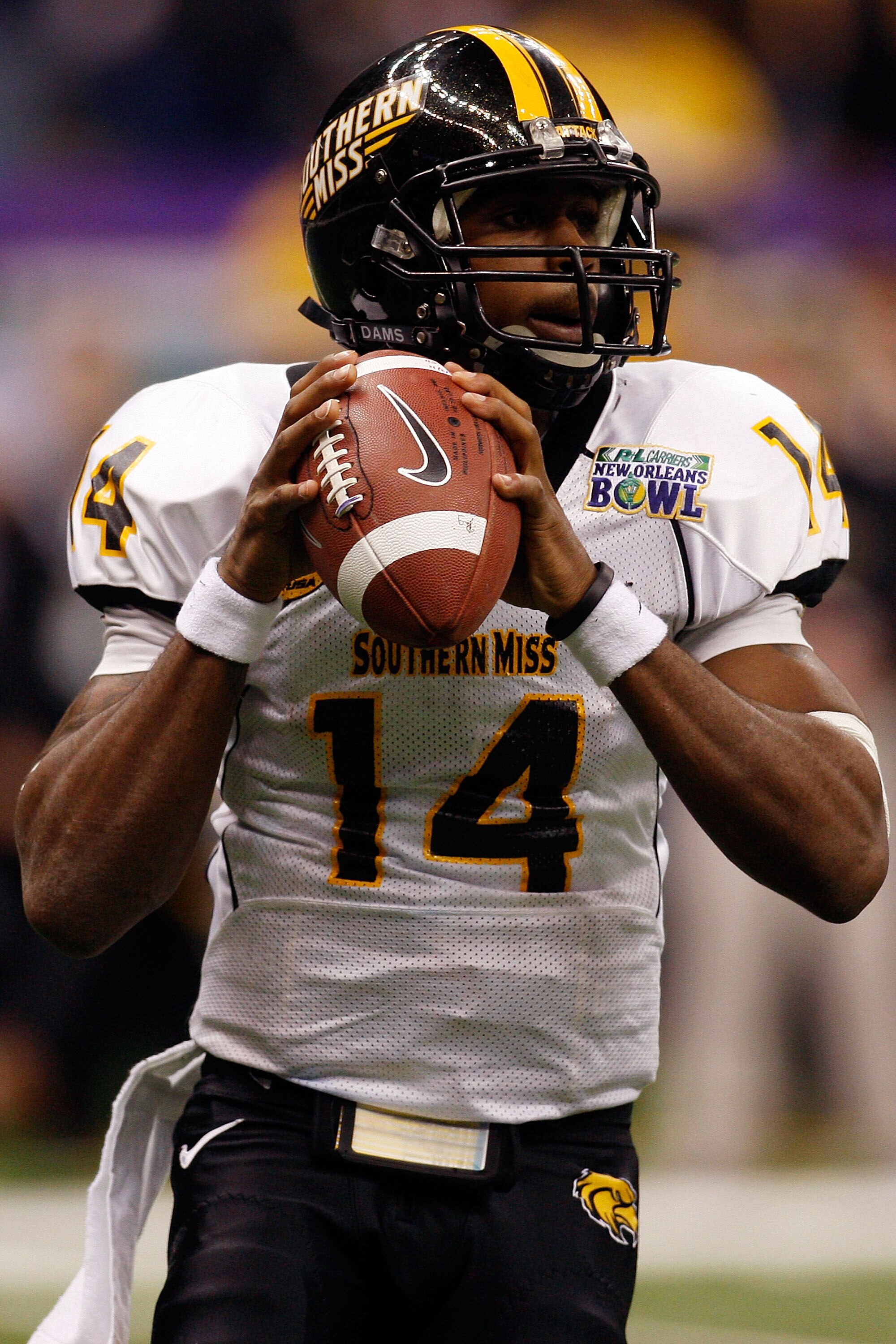 NEW ORLEANS - DECEMBER 20:  Quarterback Martevious Young #14 of the Southern Miss Golden Eagles looks to throw a pass against the Middle Tennessee Blue Raiders during the R+L Carriers New Orleans Bowl at the Louisiana Superdome on December 20, 2009 in New