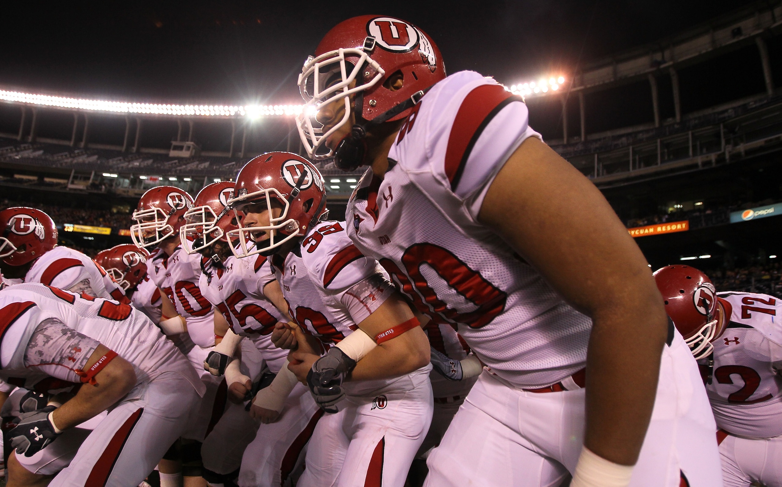 SAN DIEGO - NOVEMBER 20:  The Utah Utes get ready to take the field for the game with the San Diego State Aztecs at Qualcomm Stadium on November 20, 2010 in San Diego, California.  Utah won 38-34.  (Photo by Stephen Dunn/Getty Images)