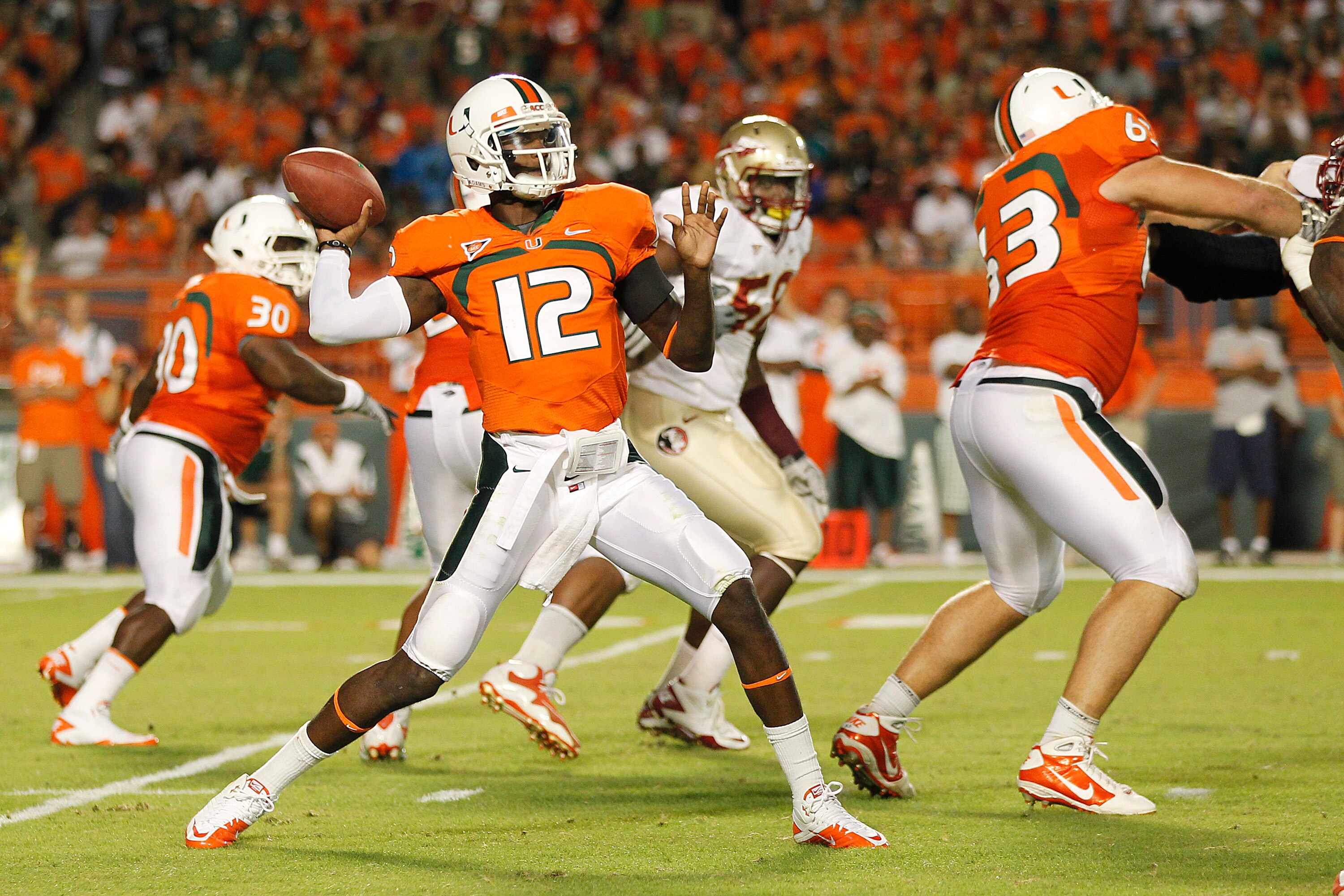 MIAMI, FL - OCTOBER 9: Jacory Harris #12 of the Miami Hurricanes hrows the ball against the Florida State Seminoles on October 9, 2010 at Sun Life Stadium in Miami, Florida. (Photo by Joel Auerbach/Getty Images)