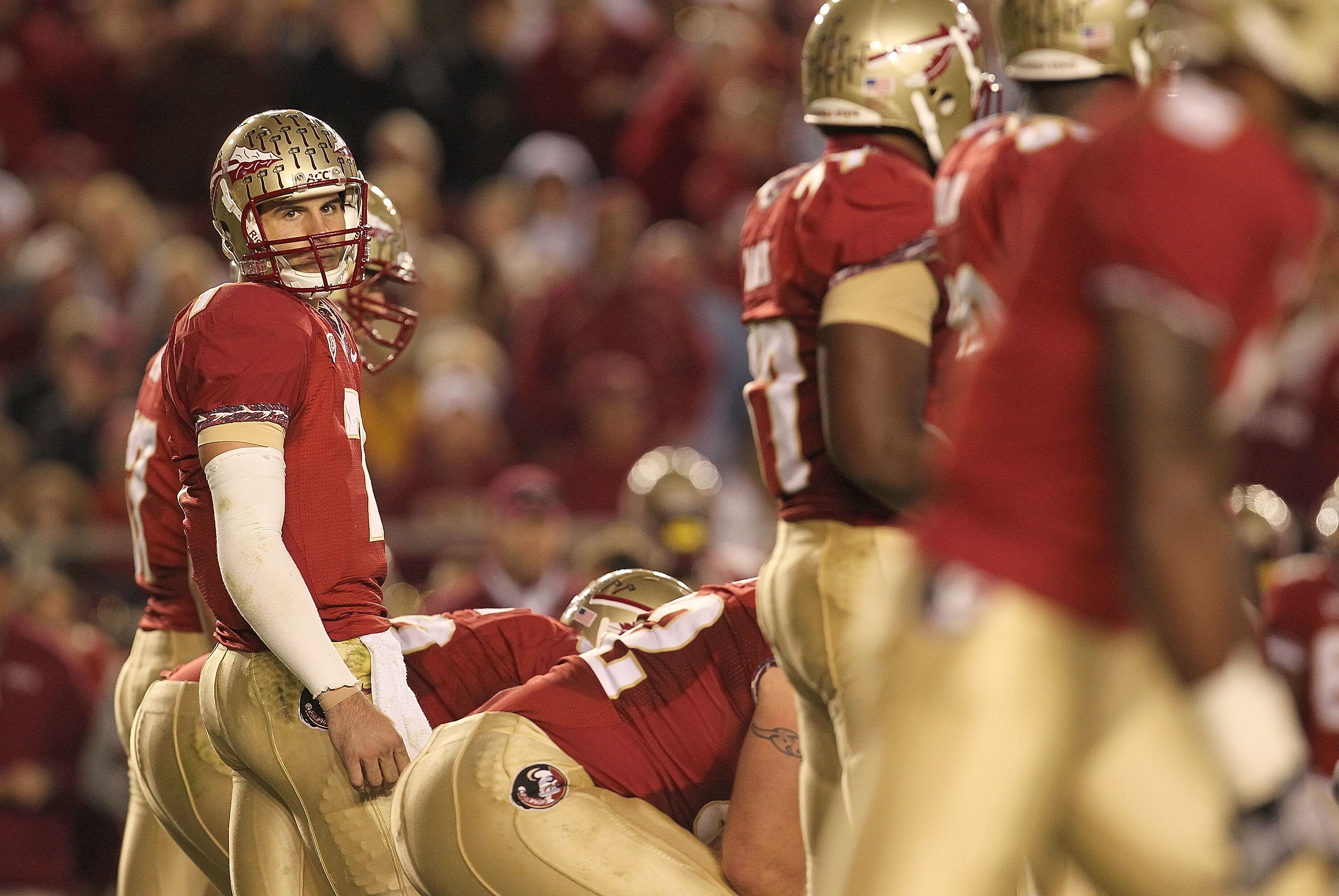 TALLAHASSEE, FL - NOVEMBER 27:  Christian Ponder #7 of the Florida State Seminoles looks for a play from the sidelines during a game against the Florida Gators at Doak Campbell Stadium on November 27, 2010 in Tallahassee, Florida.  (Photo by Mike Ehrmann/