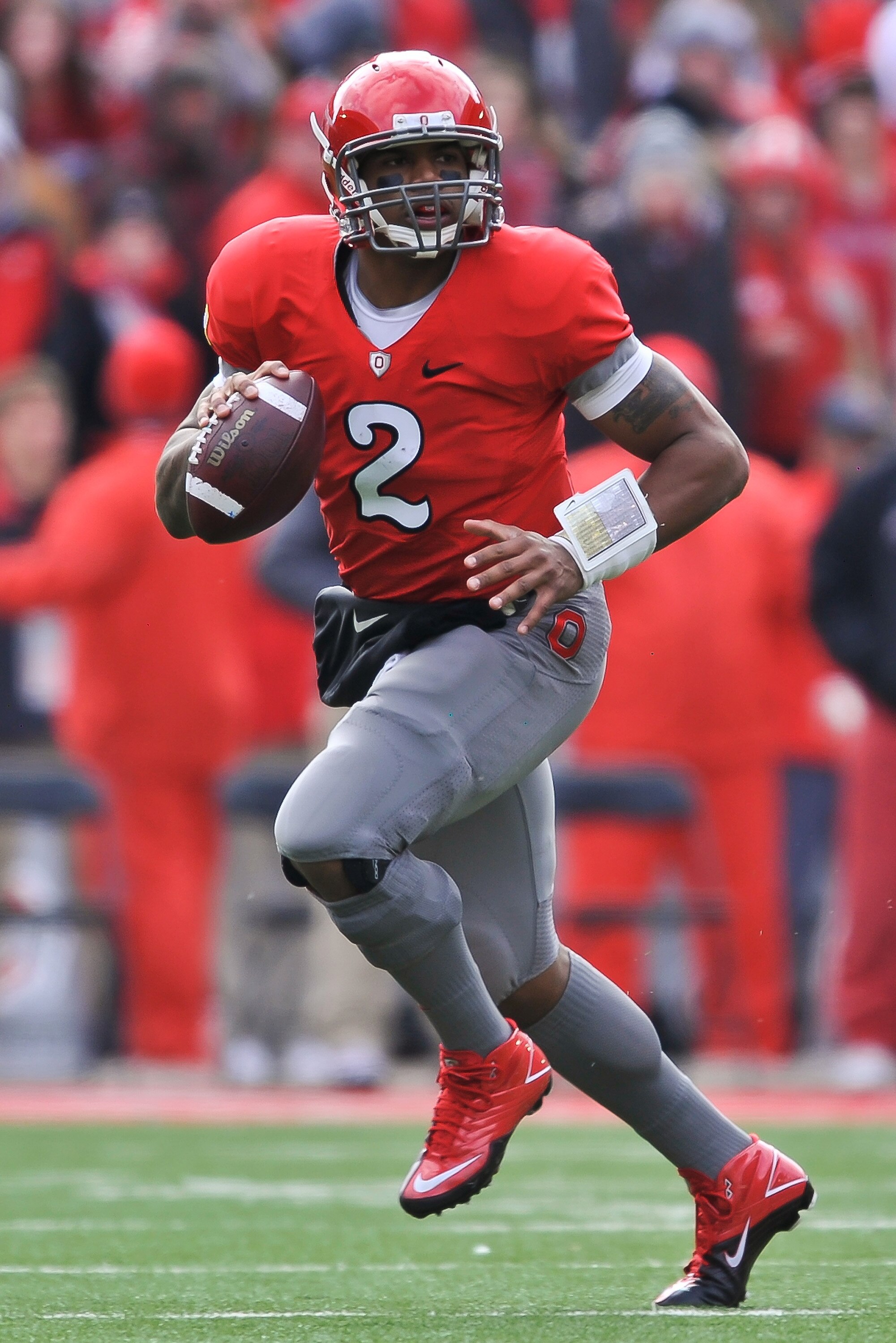 COLUMBUS, OH - NOVEMBER 27:  Quarterback Terrelle Pryor #2 of the Ohio State Buckeyes rolls out of the pocket against the Michigan Wolverines at Ohio Stadium on November 27, 2010 in Columbus, Ohio.  (Photo by Jamie Sabau/Getty Images)