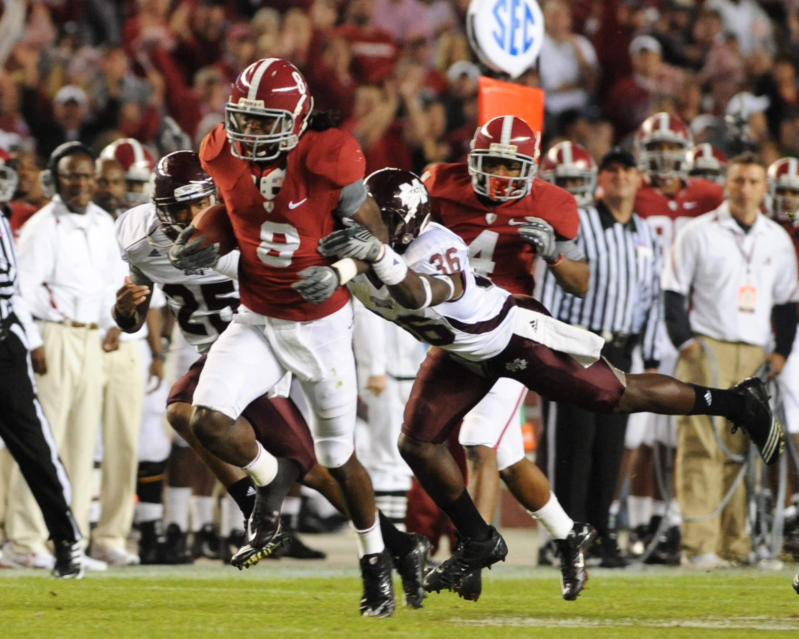 TUSCALOOSA, AL - NOVEMBER 13: Wide receiver Julio Jones #8 of the Alabama Crimson Tide runs 56 yards with a touchdown pass against the Mississippi State Bulldogs November 13, 2010 at Bryant-Denny Stadium in Tuscaloosa, Alabama. (Photo by Al Messerschmidt TUSCALOOSA, AL - NOVEMBER 13: Wide receiver Julio Jones #8 of the Alabama Crimson Tide runs 56 yards with a touchdown pass against the Mississippi State Bulldogs November 13, 2010 at Bryant-Denny Stadium in Tuscaloosa, Alabama. (Photo by Al Messerschmidt