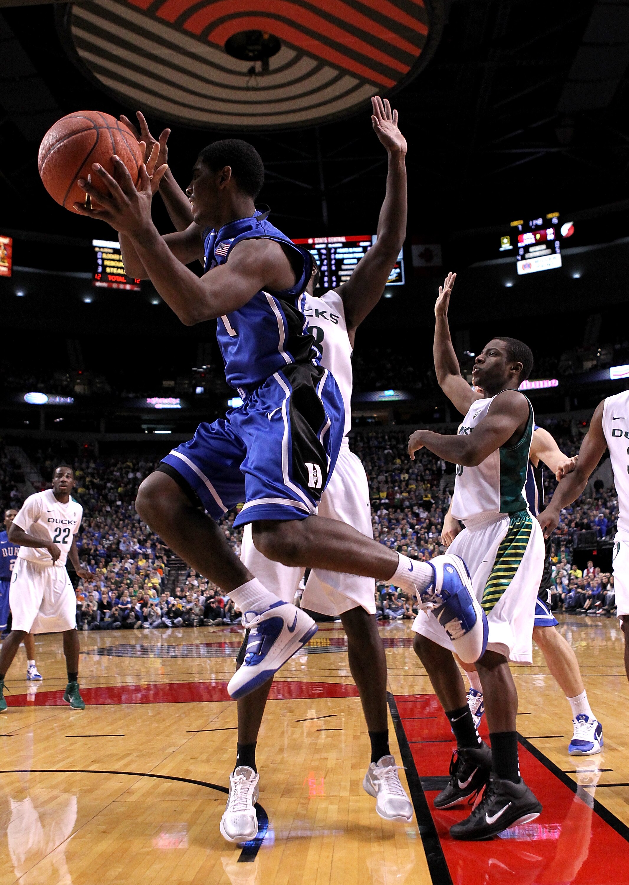 PORTLAND, OR - NOVEMBER 27:  Kyrie Irving #1 of the Duke Blue Devils looks to pass the ball against the Oregon Ducks on November 27, 2010 at the Rose Garden in Portland, Oregon.  (Photo by Jonathan Ferrey/Getty Images)