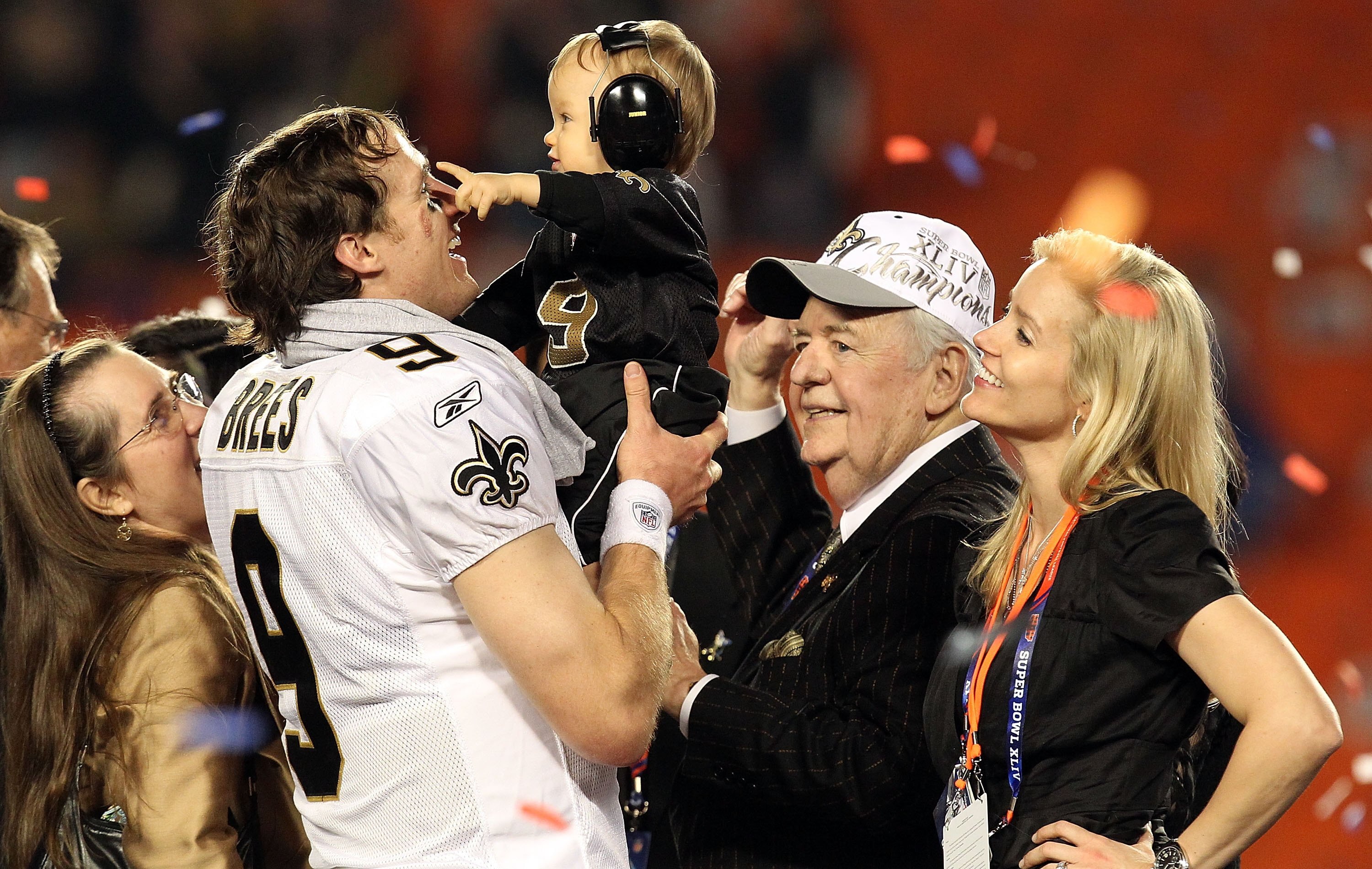 MIAMI GARDENS, FL - FEBRUARY 07:  Quarterback Drew Brees #9 of the New Orleans Saints celebrates with his family after his team defeated the Indianapolis Colts during Super Bowl XLIV on February 7, 2010 at Sun Life Stadium in Miami Gardens, Florida.  (Pho