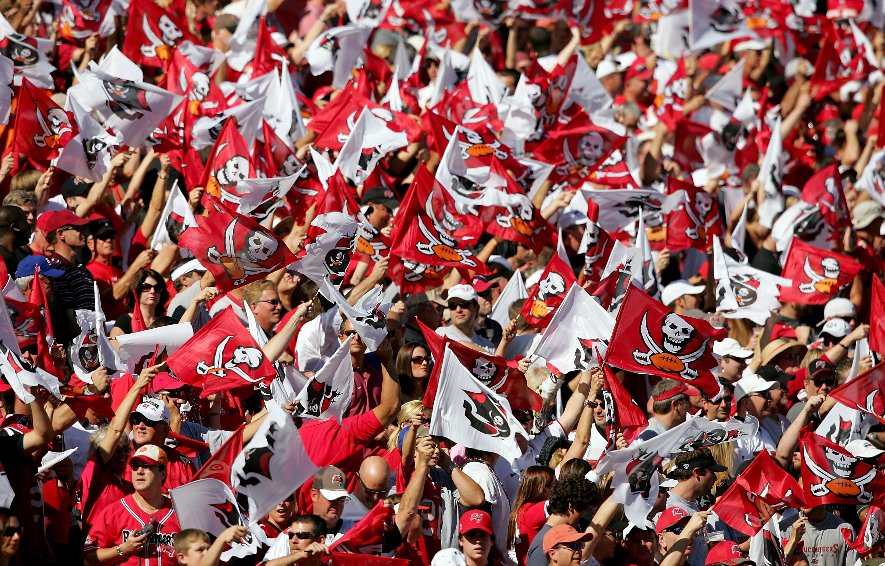 TAMPA, FL - JANUARY 06:  The Tampa Bay Buccaneers fans cheer on their team during the NFC Wild Card game against the New York Giants at Raymond James Stadium on January 6, 2008 in Tampa, Florida. The Giants won the game 24-14.  (Photo by Matthew Stockman/