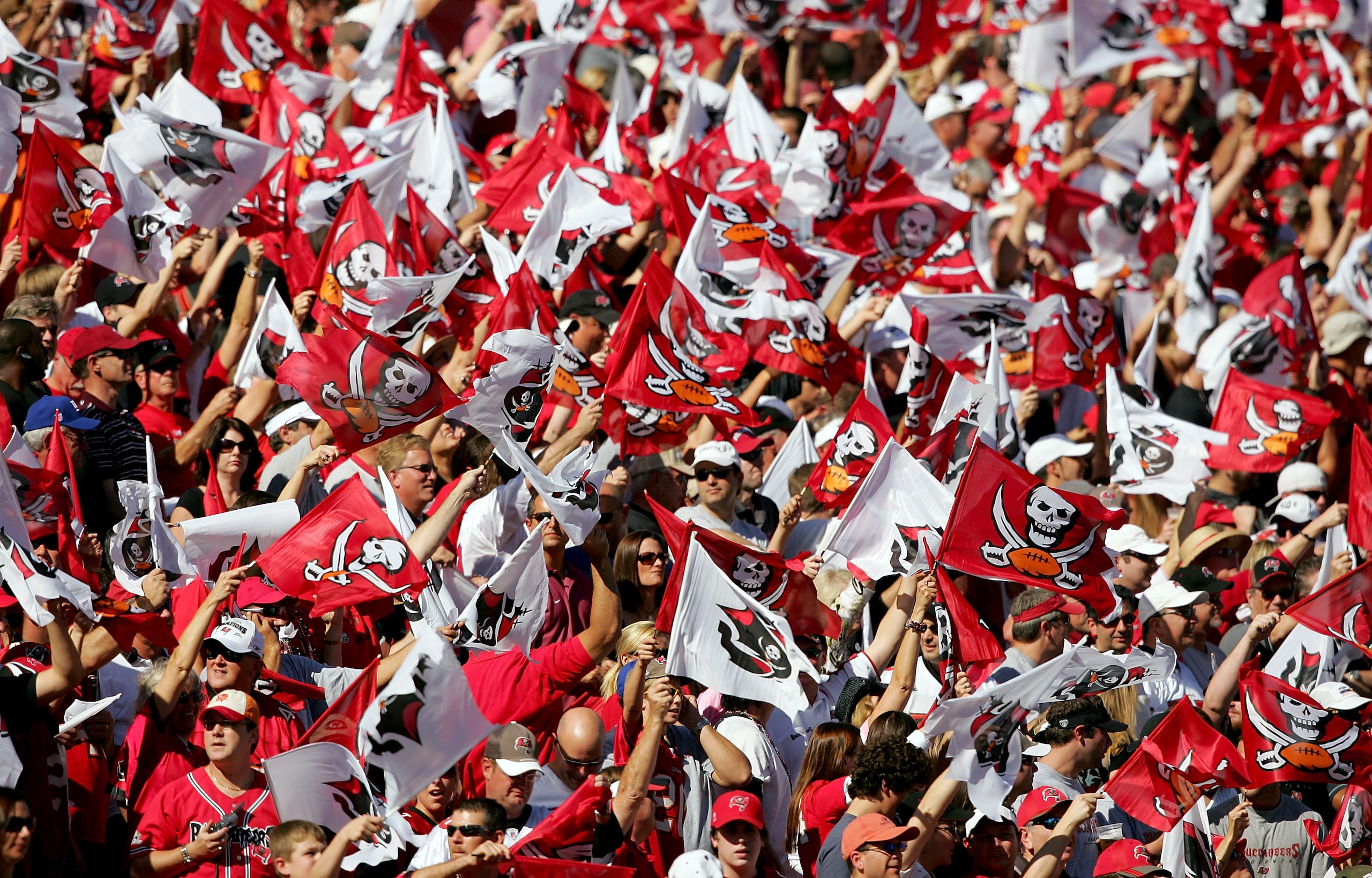 TAMPA, FL - JANUARY 06:  The Tampa Bay Buccaneers fans cheer on their team during the NFC Wild Card game against the New York Giants at Raymond James Stadium on January 6, 2008 in Tampa, Florida. The Giants won the game 24-14.  (Photo by Matthew Stockman/