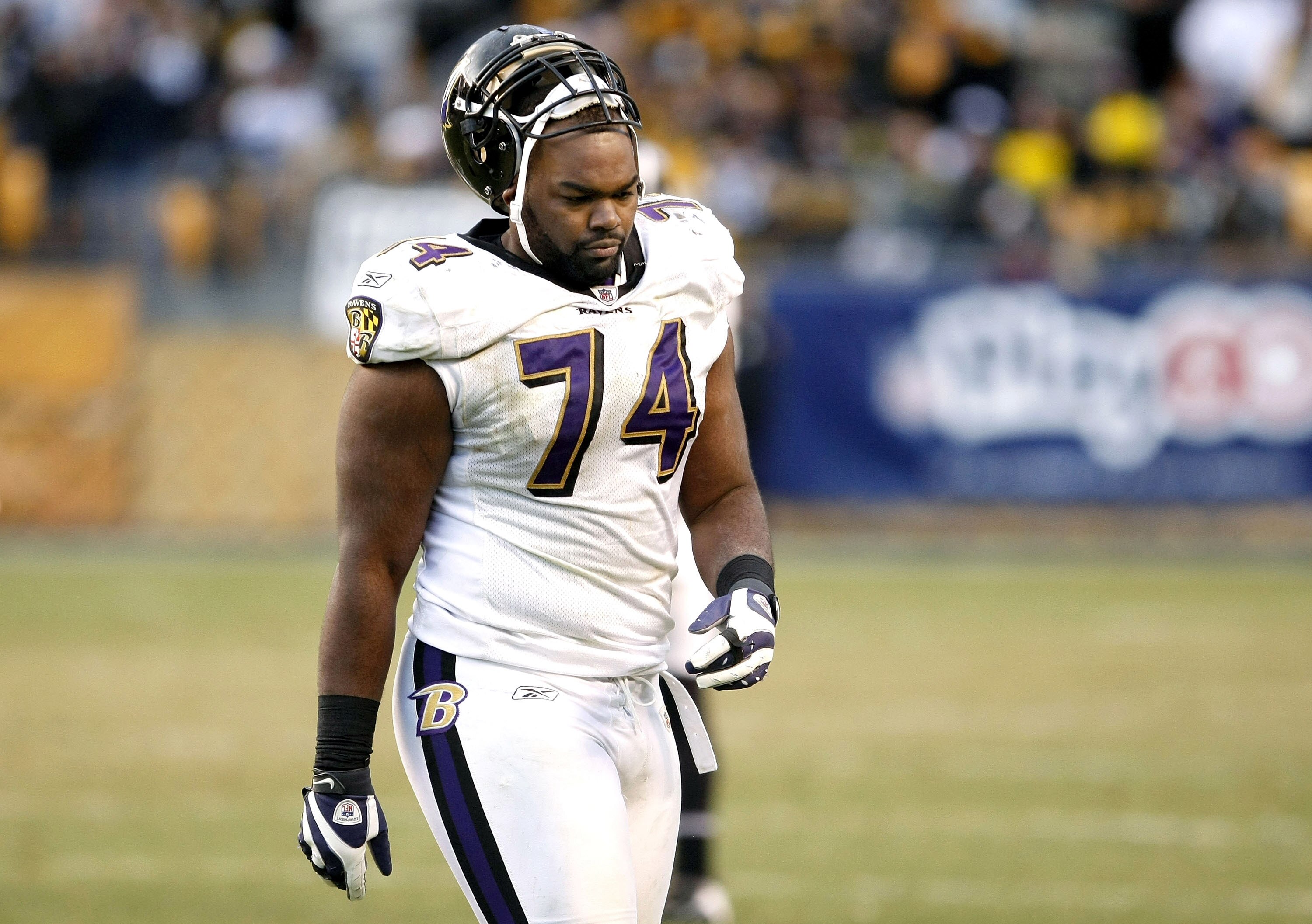 PITTSBURGH - DECEMBER 27: Michael Oher #74 of the Baltimore Ravens walks off the field during the final seconds of a 20-23 loss to the Pittsburgh Steelers on December 27, 2009 at Heinz Field in Pittsburgh, Pennsylvania.  (Photo by Gregory Shamus/Getty Ima