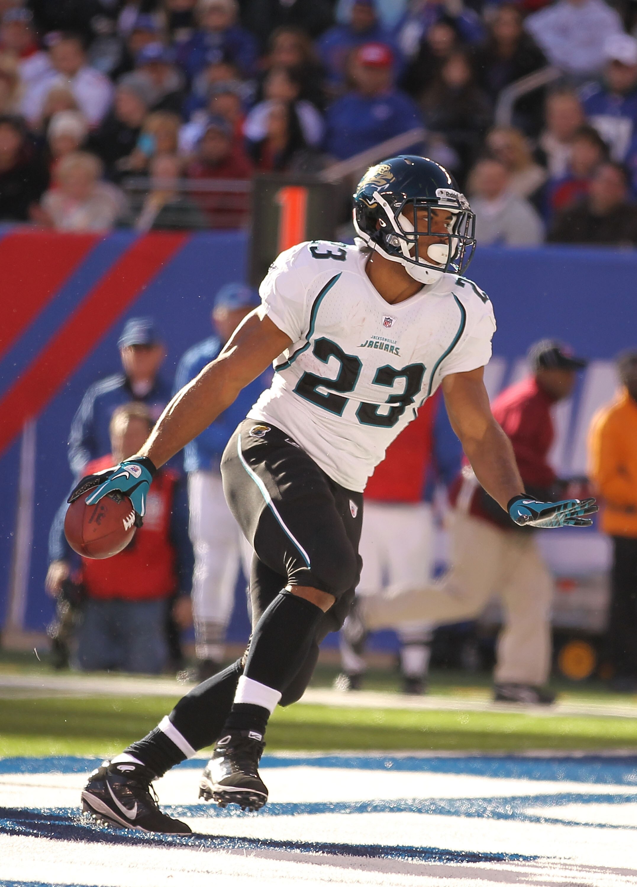 EAST RUTHERFORD, NJ - NOVEMBER 28:  Rashad Jennings #23 of the Jacksonville Jaguars scores a touchdown against  the New York Giants during the second Quarter of their game on November 28, 2010 at The New Meadowlands Stadium in East Rutherford, New Jersey.