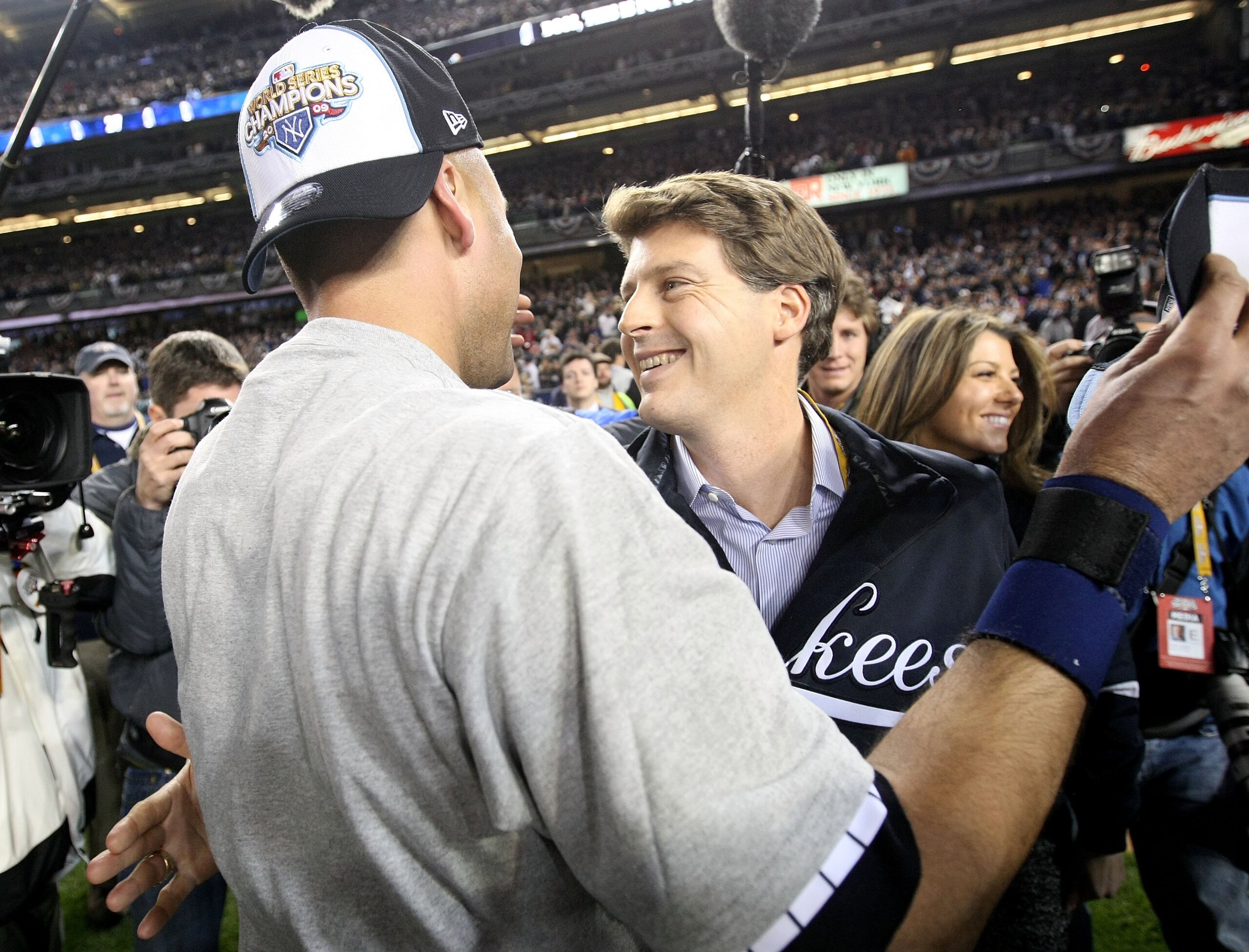 NEW YORK - NOVEMBER 04:  New York Yankees Managing General Partner Hal Steinbrenner of the New York Yankees celebrates with the Derek Jeter #2 after their 7-3 win against the Philadelphia Phillies in Game Six of the 2009 MLB World Series at Yankee Stadium