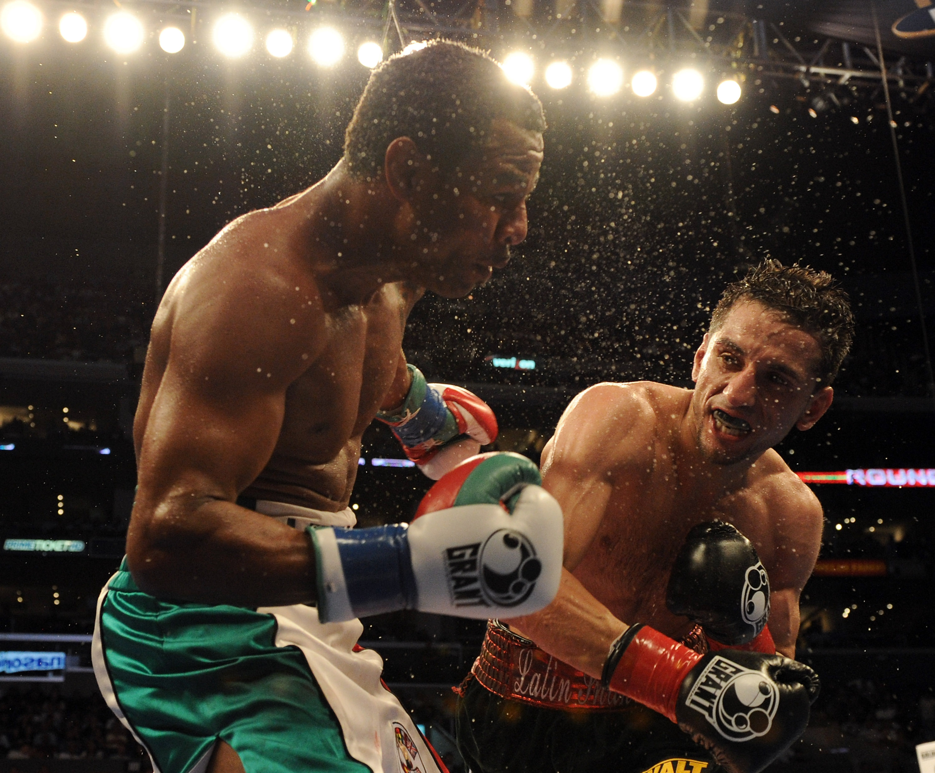 LOS ANGELES, CA - SEPTEMBER 18:  Sergio Mora punches Shane Mosley during the eighth round in a Middleweight bout at Staples Center on September 18, 2010 in Los Angeles, California.  The fight ended in a draw.  (Photo by Harry How/Getty Images)