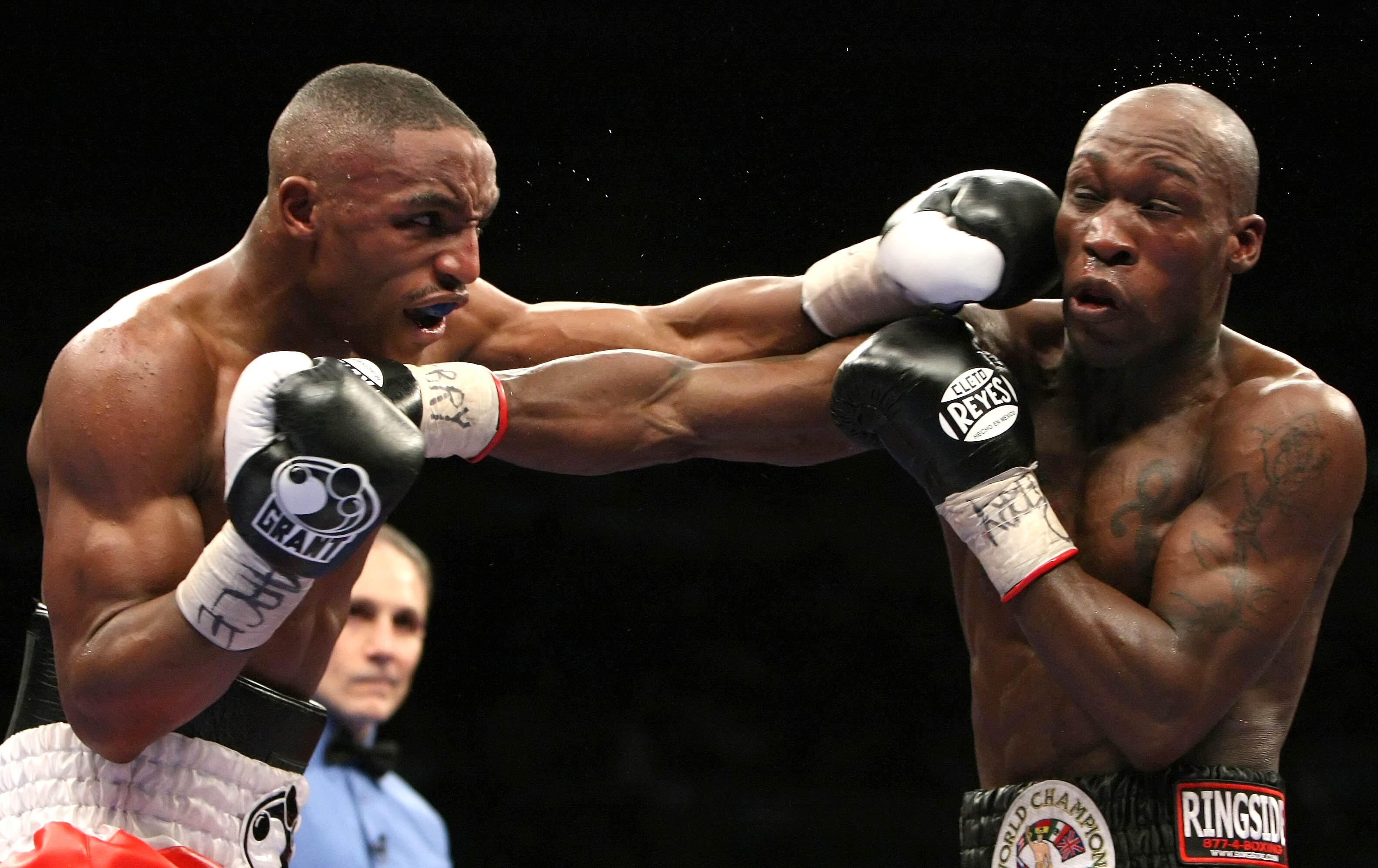 NEW YORK - JANUARY 19:  Devon Alexander (L) lands a left punch against DeMarcus Corley (R) during their WBC Continental Super Welterweight Championship bout at Madison Square Garden January 19, 2008 in New York City. Devon Alexander won the 10 round fight