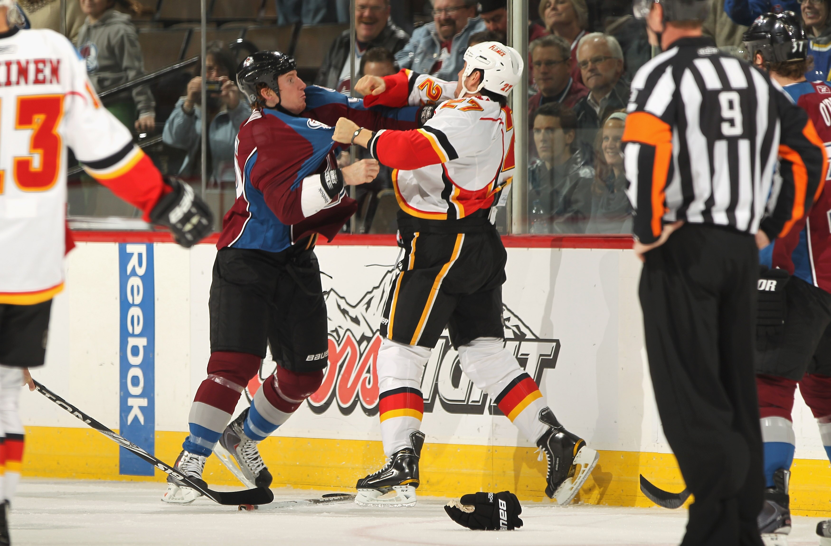 DENVER - NOVEMBER 09:  Steve Staios #27 of the Calgary Flames and Cody McLeod #55 of the Colorado Avalanche engage in a fight during the first period at the Pepsi Center on November 9, 2010 in Denver, Colorado.  (Photo by Doug Pensinger/Getty Images)