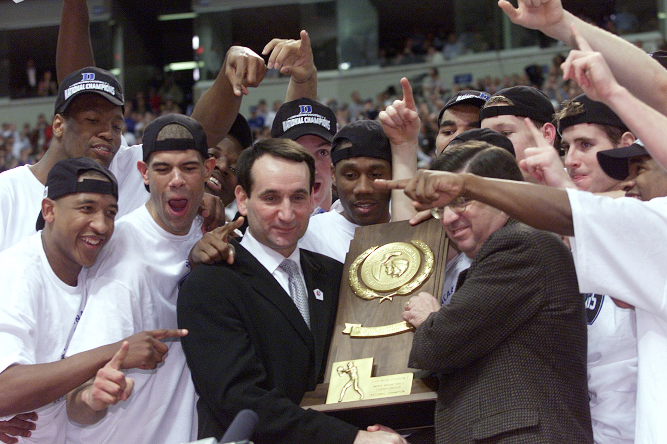2 Apr 2001:  Head coach Mike Krzyzewski of Duke is awarded with the trophy after defeating Arizona 82-72 in the NCAA National Championship Game of the Men's Final Four tournament at the Metrodome in Minneapolis, Minnesota.  DIGITAL IMAGE.Mandatory Credit: