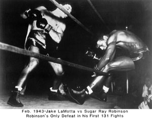 LaMotta knocks Sugar Ray Robinson out of the ring
