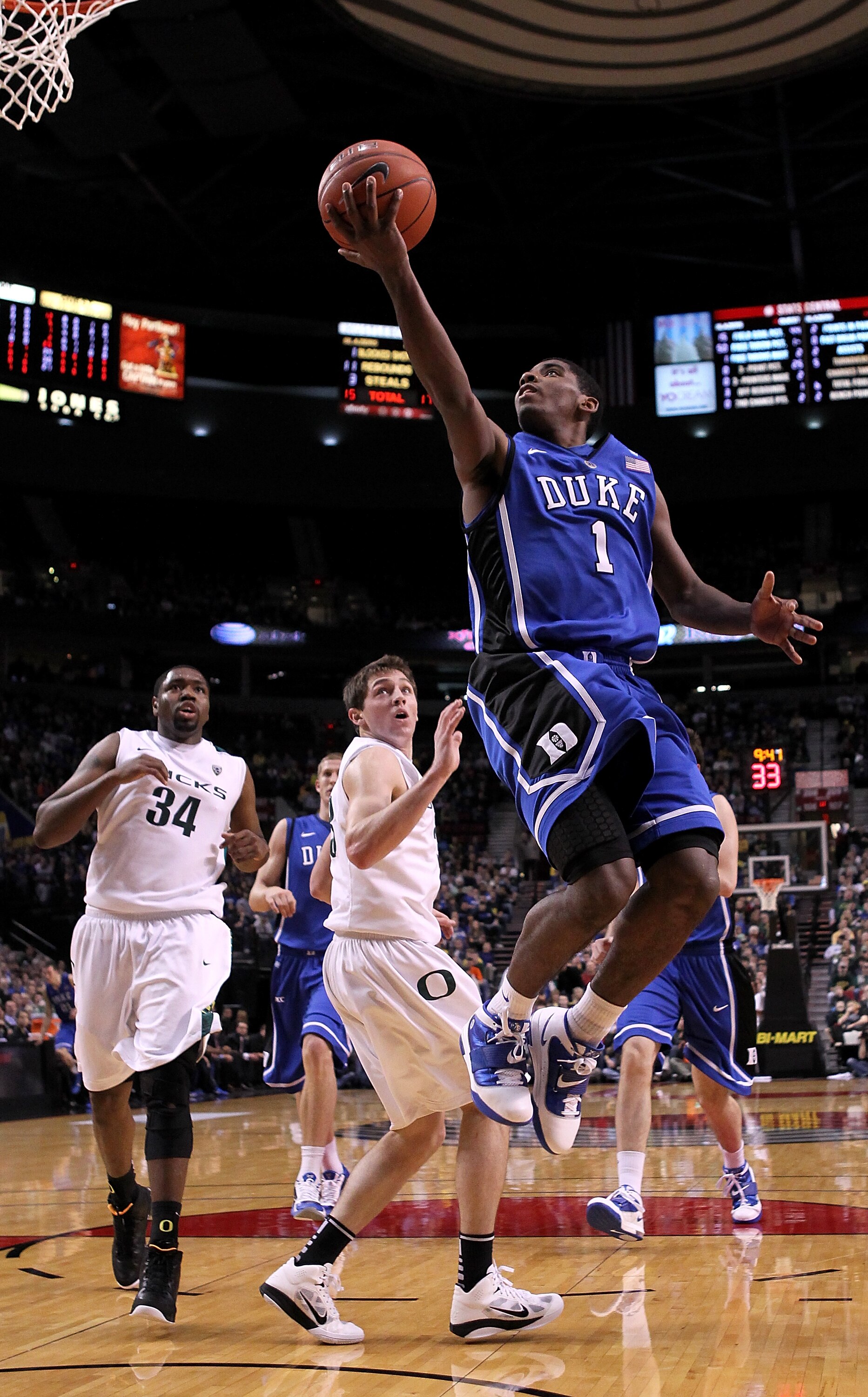 PORTLAND, OR - NOVEMBER 27:  Kyrie Irving #1 of the Duke Blue Devils goes for a layup against the Oregon Ducks on November 27, 2010 at the Rose Garden in Portland, Oregon.  (Photo by Jonathan Ferrey/Getty Images)