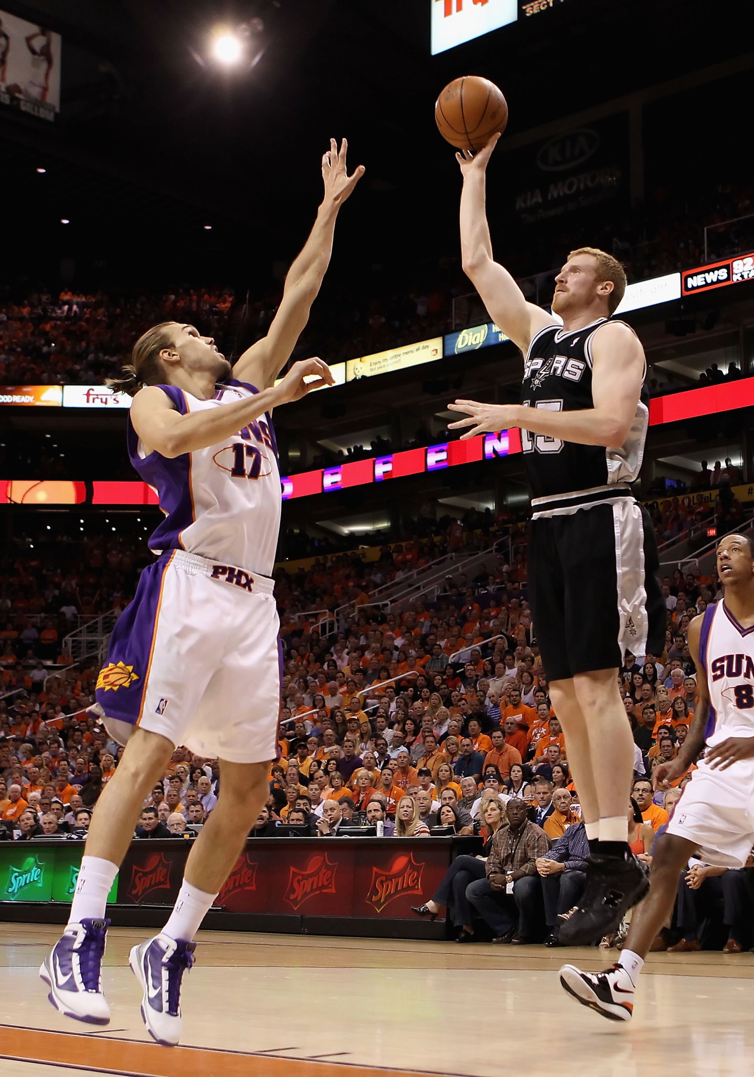 PHOENIX - MAY 03: Matt Bonner #15 of the San Antonio Spurs puts up a shot against Louis Amundson #17 of the Phoenix Suns during Game One of the Western Conference Semifinals of the 2010 NBA Playoffs at US Airways Center on May 3, 2010 in Phoenix, Arizona PHOENIX - MAY 03: Matt Bonner #15 of the San Antonio Spurs puts up a shot against Louis Amundson #17 of the Phoenix Suns during Game One of the Western Conference Semifinals of the 2010 NBA Playoffs at US Airways Center on May 3, 2010 in Phoenix, Arizona