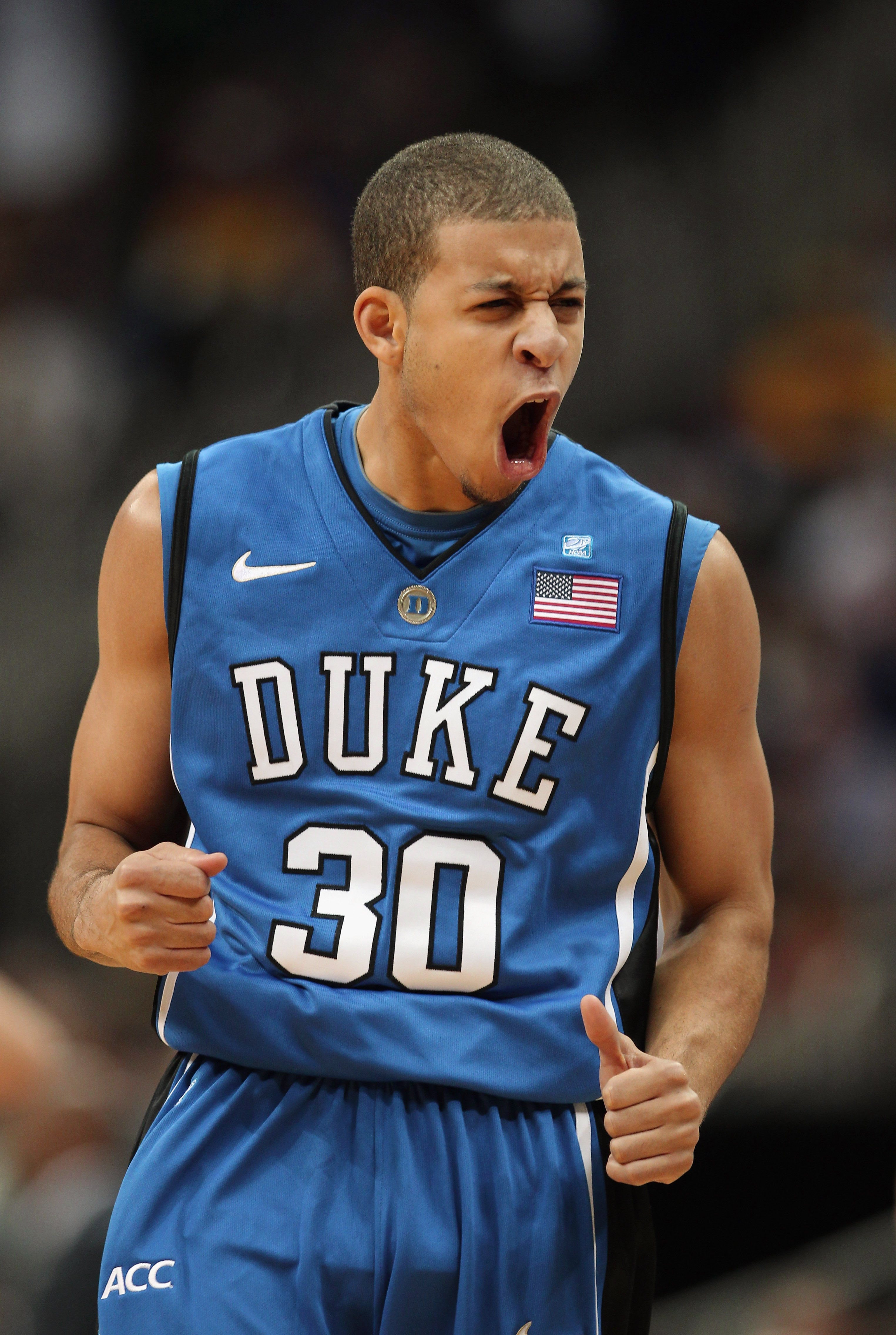 KANSAS CITY, MO - NOVEMBER 22:  Seth Curry #30 of the Duke Blue Devils reacts after sinking a basket during the CBE Classic game against the Marquette Golden Eagles on November 22, 2010 at the Sprint Center in Kansas City, Missouri.  (Photo by Jamie Squir