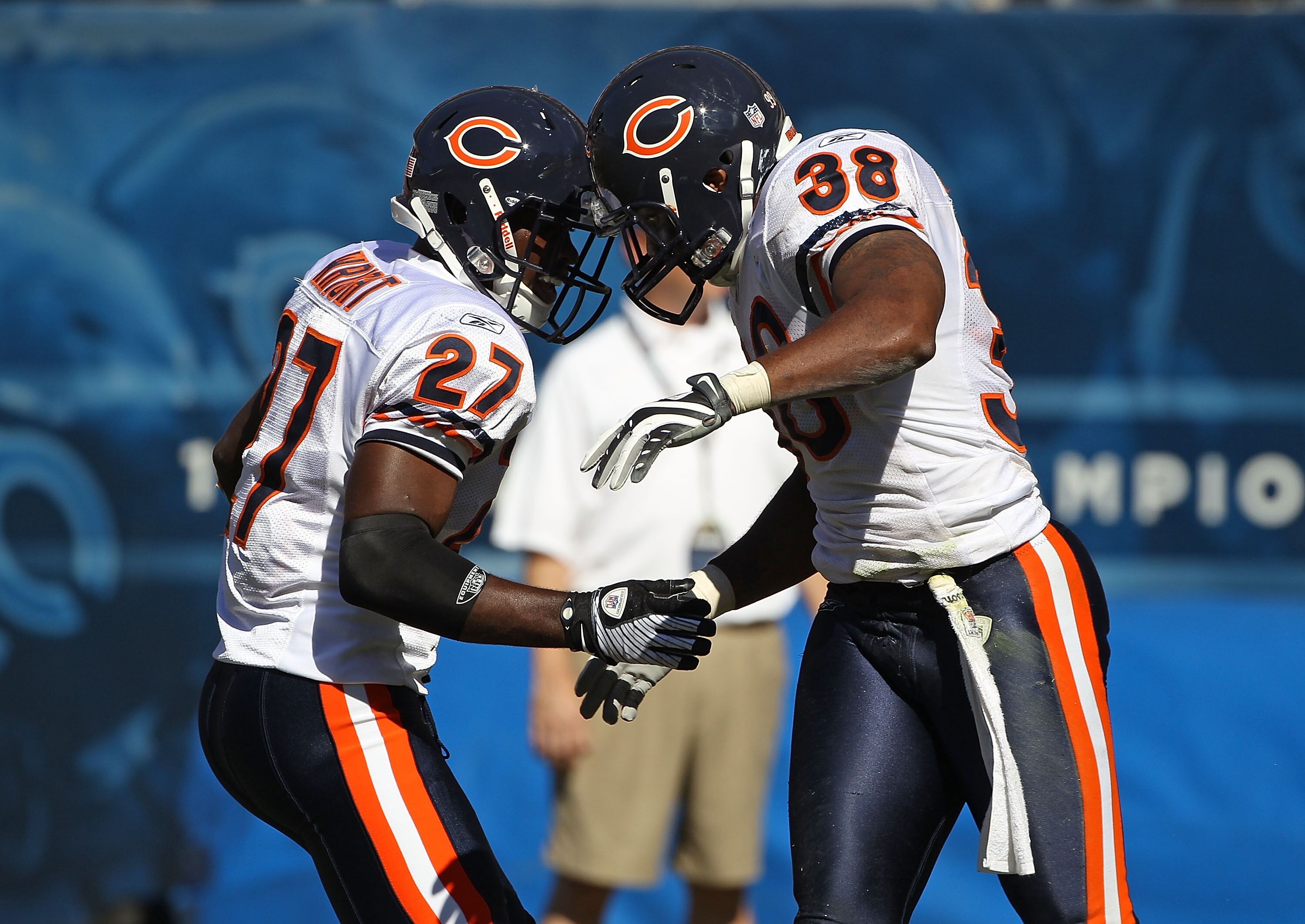 CHICAGO - SEPTEMBER 12: Major Wright #27 and Danieal Manning #38 of the Chicago Bears celebrate a defensive play against the Detroit Lions during the NFL season opening game at Soldier Field on September 12, 2010 in Chicago, Illinois. The Bears defeated t