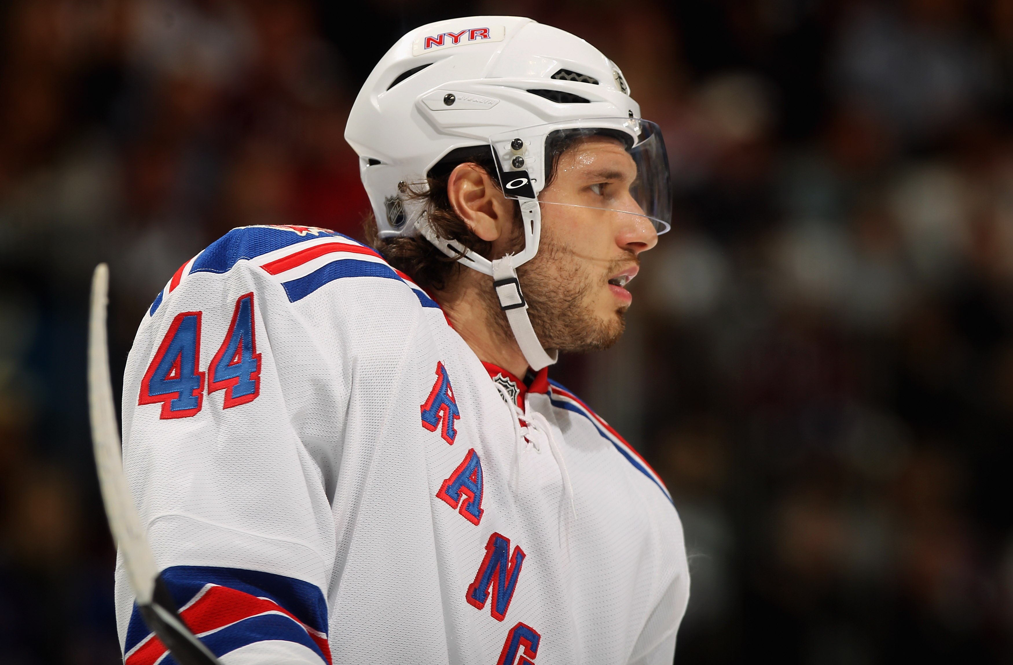 DENVER - NOVEMBER 19:  Steve Eminger #44 of the New York Rangers looks on during a break in the action against the Colorado Avalanche at the Pepsi Center on November 19, 2010 in Denver, Colorado. The Avalanche defeated the Rangers 5-1.  (Photo by Doug Pen