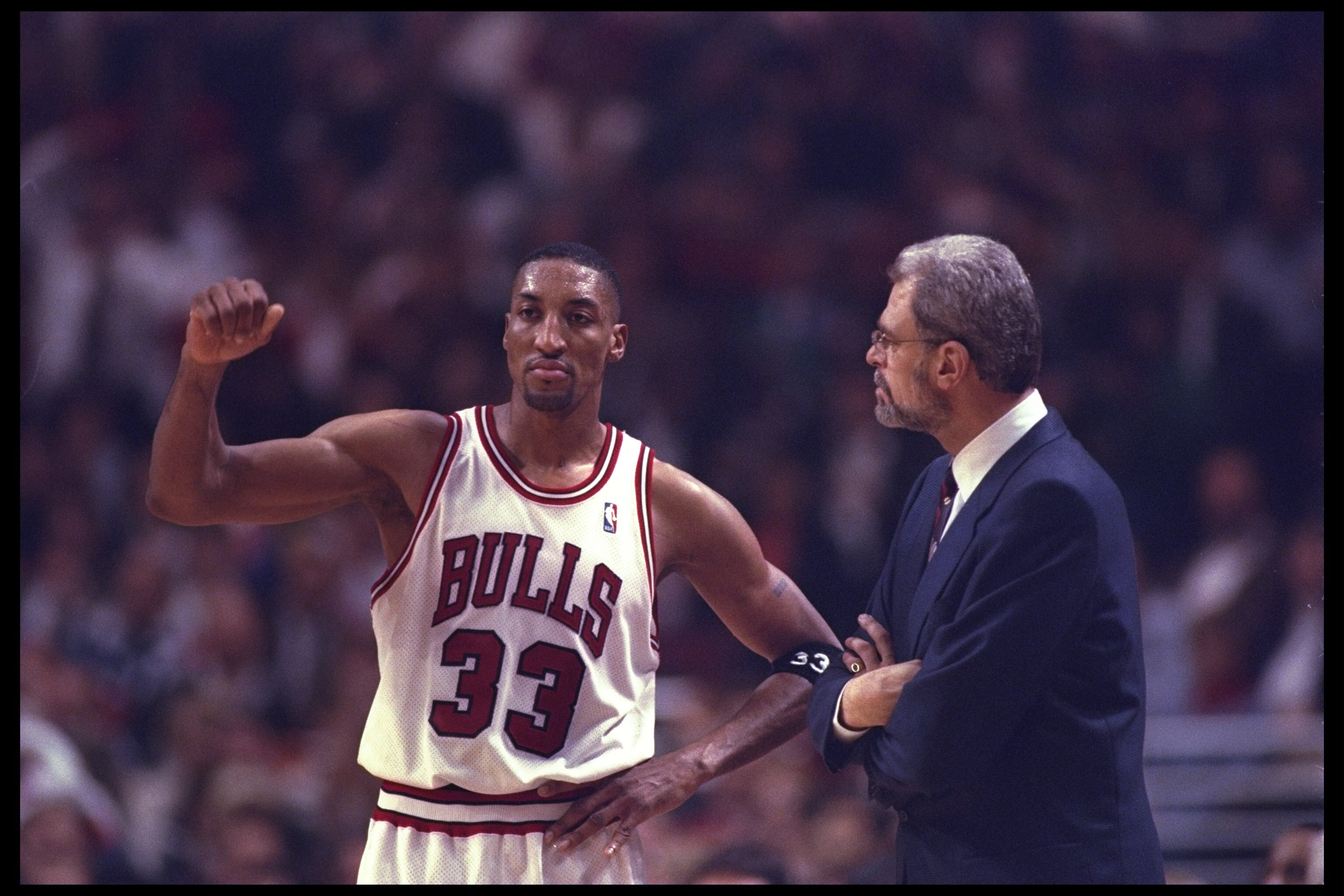 14 May 1996:  Chicago Bulls head coach Phil Jackson and guard Scottie Pippen confer during a game against the New York Knicks played at the United Center in Chicago, Illinois.  The Bulls won the game, 94-81. Mandatory Credit: Doug Pensinger/Allsport