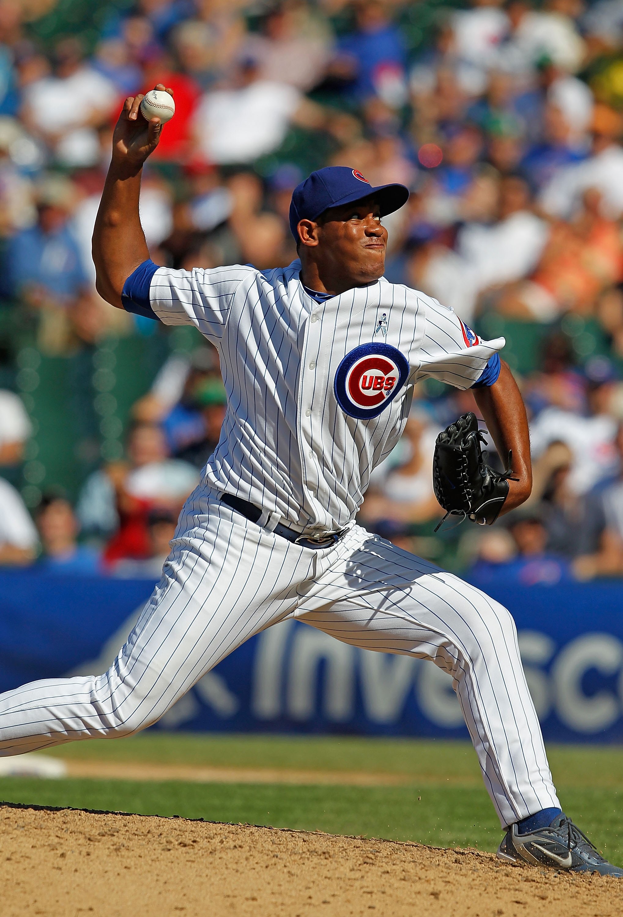 CHICAGO - JUNE 20: Carlos Marmol #49 of the Chicago Cubs pitches in the 9th inning against the Los Angeles Angels of Anaheim at Wrigley Field on June 20, 2010 in Chicago, Illinois. The Cubs defeated the Angels 12-1. (Photo by Jonathan Daniel/Getty Images)