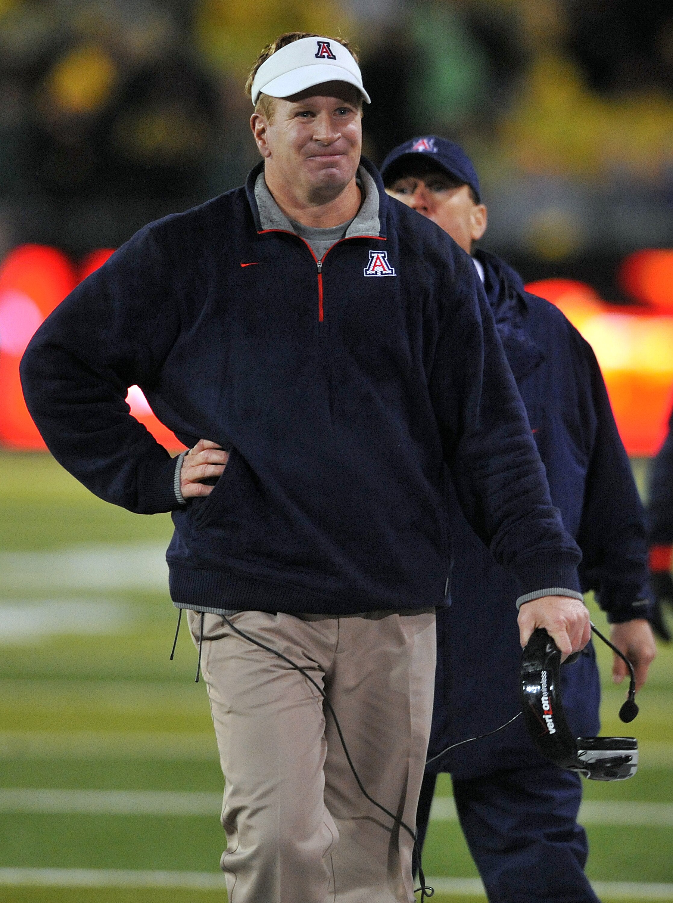 EUGENE, OR - NOVEMBER 26: Head coach Mike Stoops of the Arizona Wildcats shows his dissatisfaction with an officials call in the second quarter of the game against the Oregon Ducks at Autzen Stadium on November 26, 2010 in Eugene, Oregon.The Ducks won the
