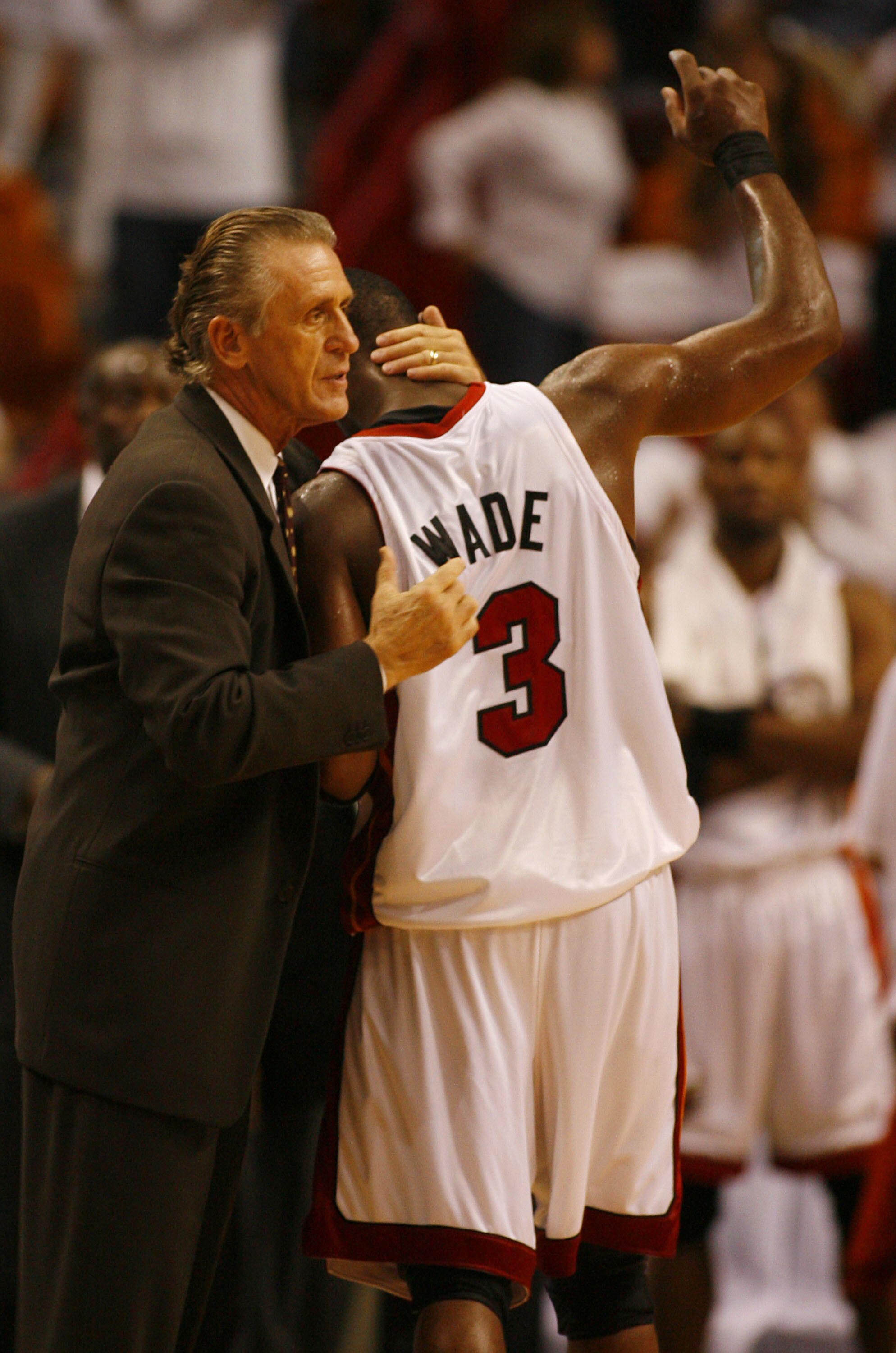 MIAMI - APRIL 29:  Guard Dwyane Wade #3 of the Miami Heat gets a hug from Head Coach Pat Riley in the fourth period against the Chicago Bulls in Game Four of the Eastern Conference Quarterfinals during the 2007 NBA Playoffs on April 29, 2007 at American A