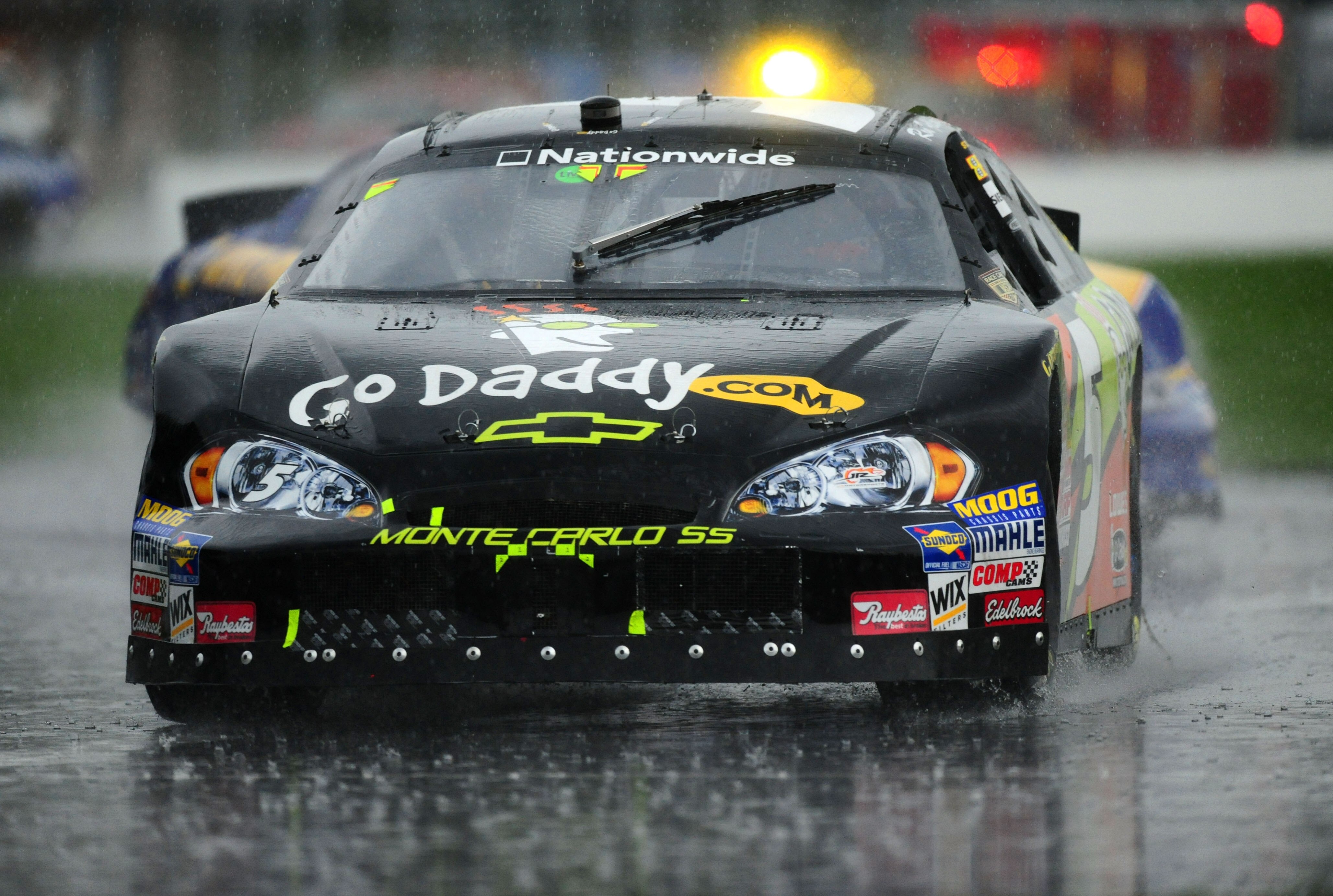 MONTREAL, QC - AUGUST 02: Ron Fellows driver of the #5 Rick Hendrick GoDaddy.com Chevrolet drives in the rain before the last red flag is called during the NASCAR Nationwide Series Napa Auto Parts 200 Montreal presented by Dodge on August 2, 2008 at the C