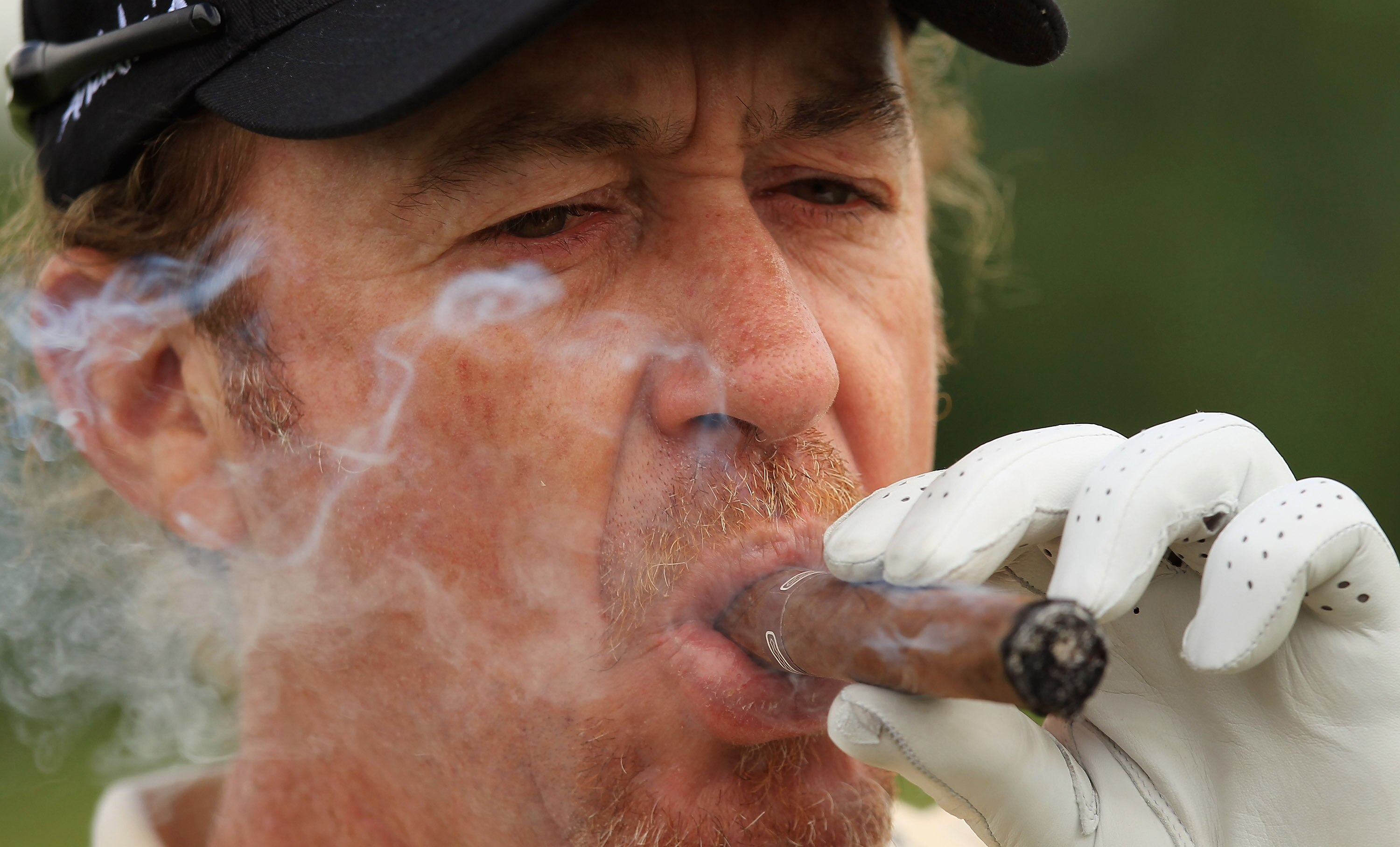 NEWPORT, WALES - JUNE 02:  Miguael Angel Jimenez of Spain lights up a cigar on the second tee during the Pro-Am for the Celtic Manor Wales Open on The Twenty Ten Course on June 2, 2010 in Newport, Wales.  (Photo by Warren Little/Getty Images)