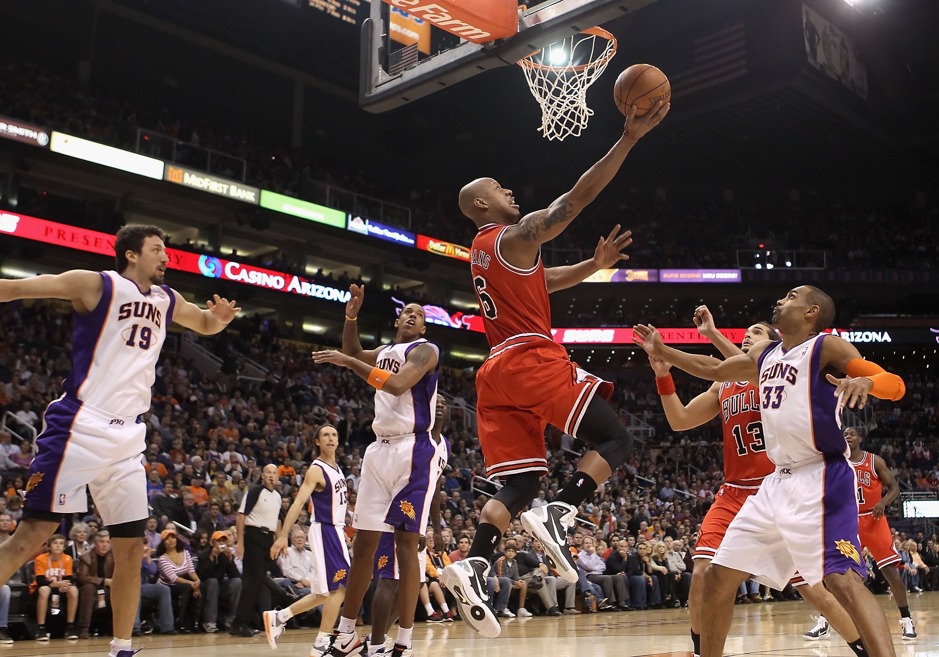 PHOENIX - NOVEMBER 24:  Keith Bogans #6 of the Chicago Bulls lays up a shot during the NBA game against the Phoenix Suns at US Airways Center on November 24, 2010 in Phoenix, Arizona. NOTE TO USER: User expressly acknowledges and agrees that, by downloadi