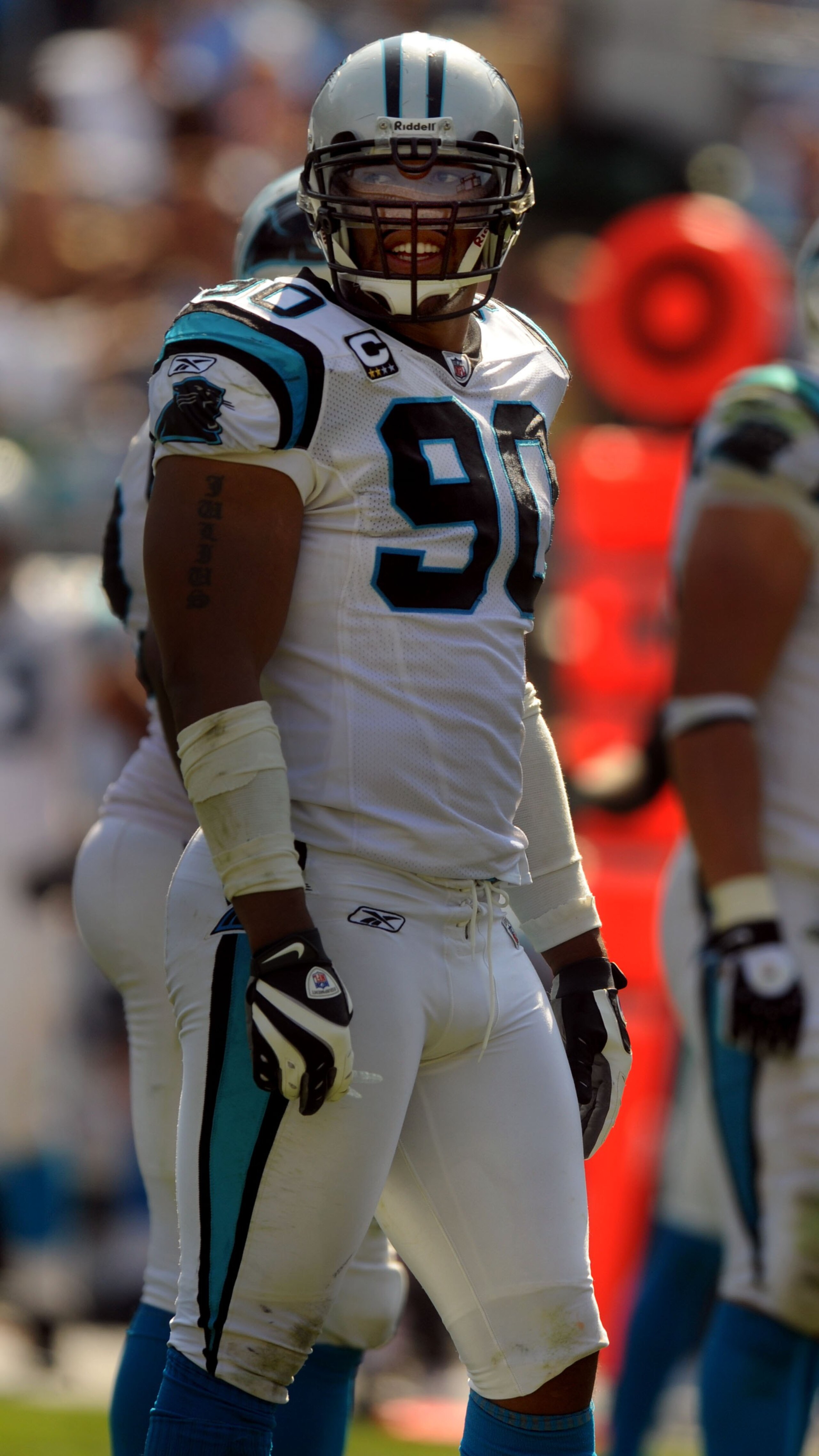 CHARLOTTE, NC - SEPTEMBER 28:  Defensive end Julius Peppers #99 of the Carolina Panthers looks over at the sidelines in the third quarter of the game against the Atlanta Falcons at Bank of America Stadium on September 28, 2008 in Charlotte, North Carolina