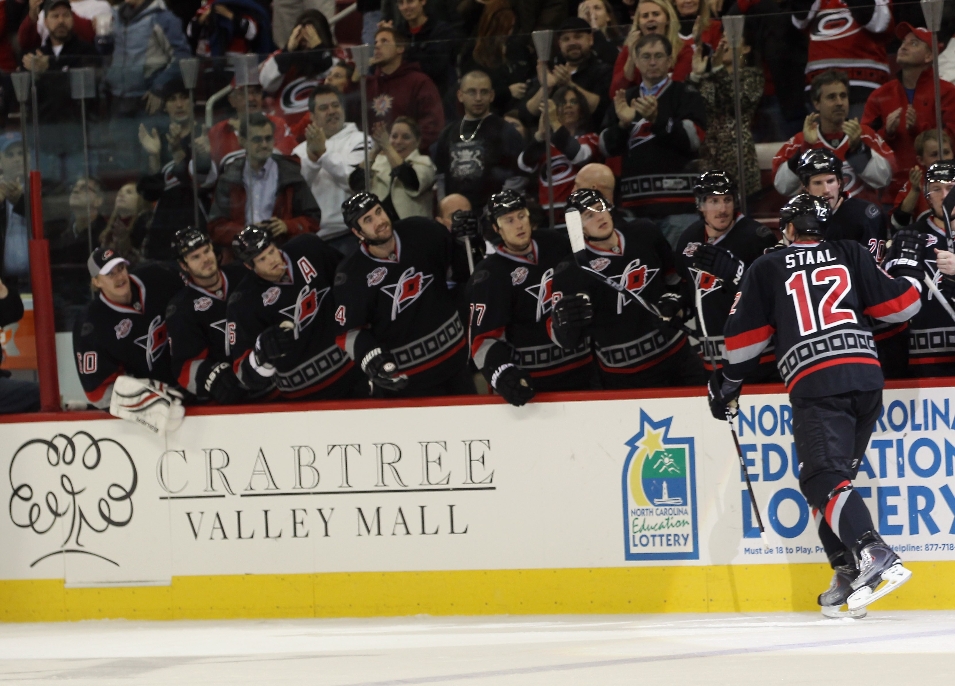 RALEIGH, NC - NOVEMBER 29: Eric Staal #12 of the Carolina Hurricanes scores a second period goal against the Dallas Stars at the RBC Center on November 29, 2010 in Raleigh, North Carolina.  (Photo by Bruce Bennett/Getty Images)