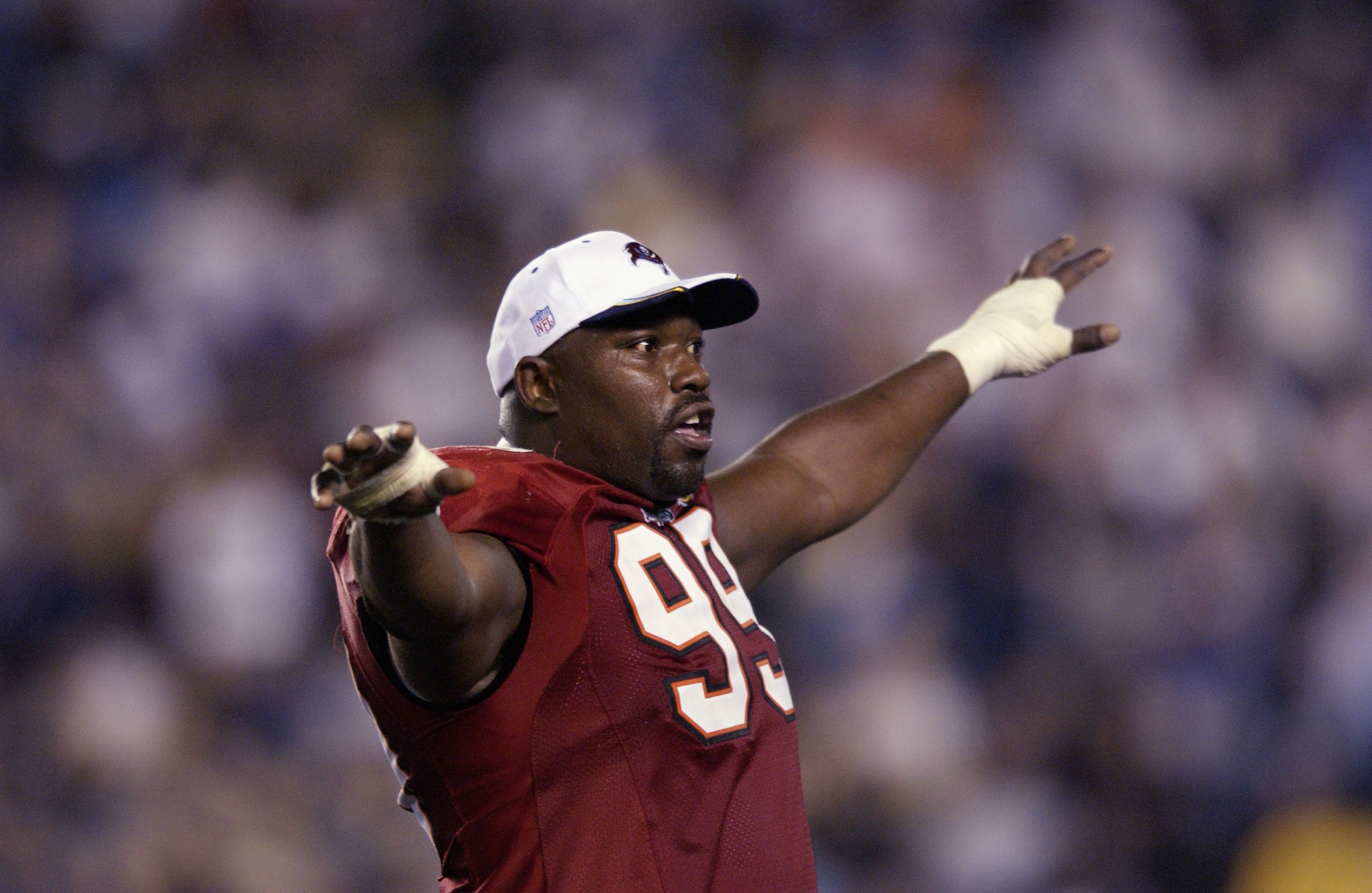 SAN DIEGO - JANUARY 26:  Warren Sapp #99 of the Tampa Bay Buccaneers celebrates the victory over the Oakland Raiders in Super Bowl XXXVII on January 26, 2003 at Qualcomm Stadium in San Diego, California.  The Buccaneers won 48-21.  (Photo by Ezra Shaw/Get
