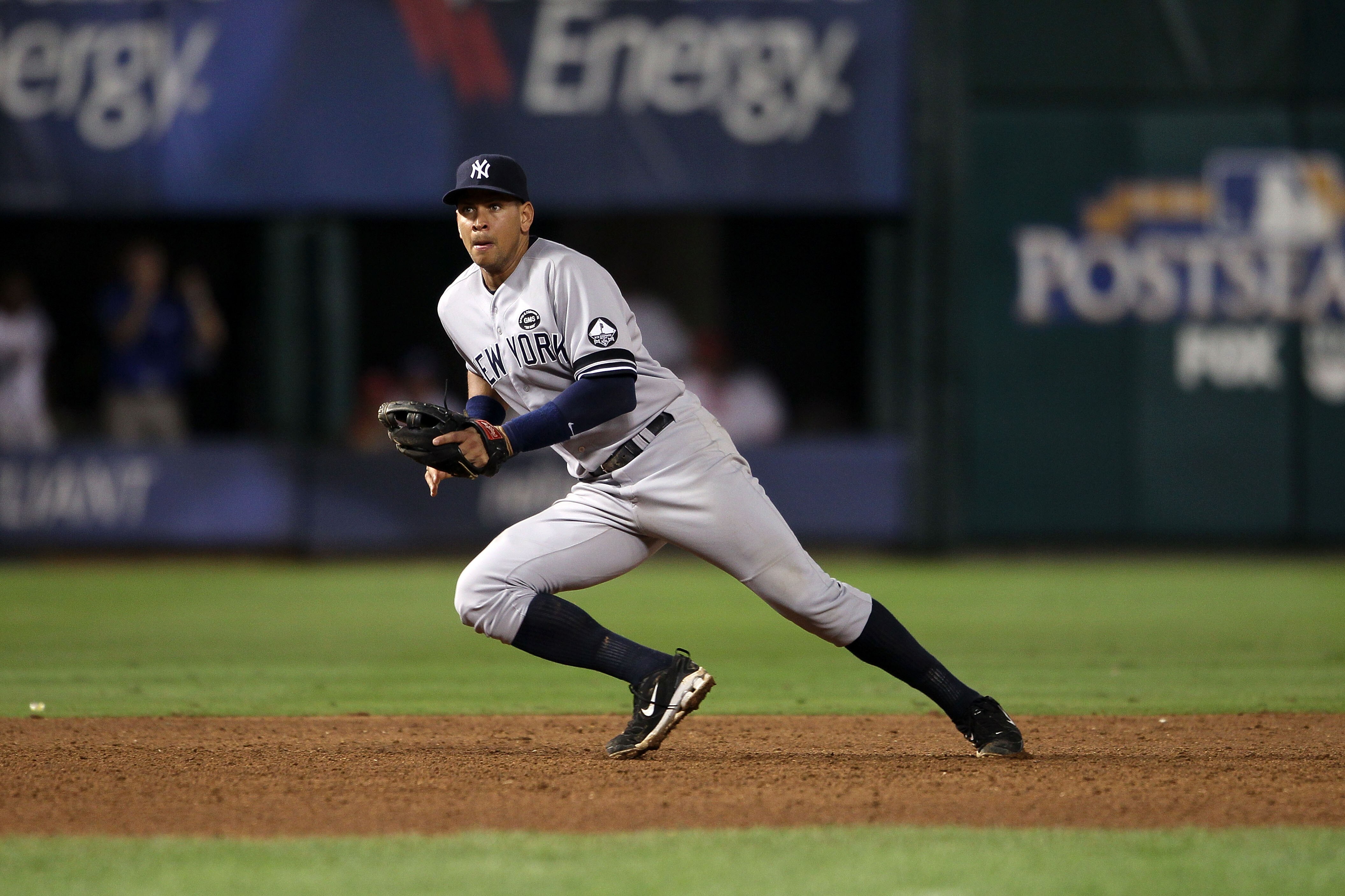 ARLINGTON, TX - OCTOBER 22:  Alex Rodriguez #13 of the New York Yankees makes a play for a ball on defense against the Texas Ranger in Game Six of the ALCS during the 2010 MLB Playoffs at Rangers Ballpark in Arlington on October 22, 2010 in Arlington, Tex