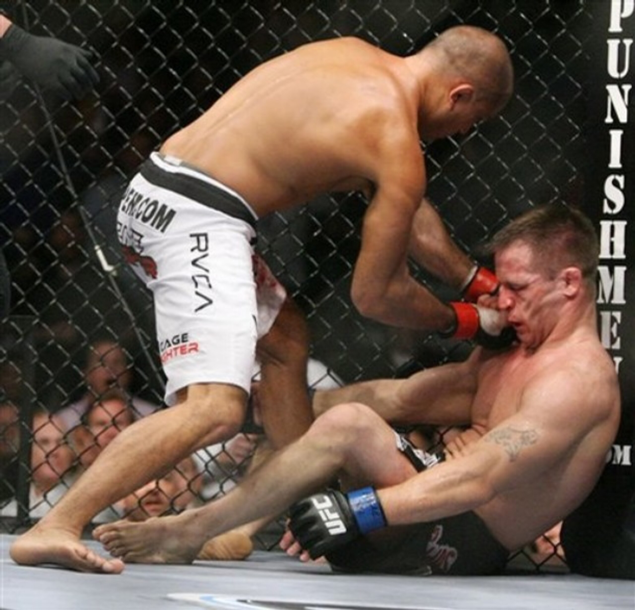 BJ Penn landing a shot to Sean Sherk's face after he flying-kneed him in the face.